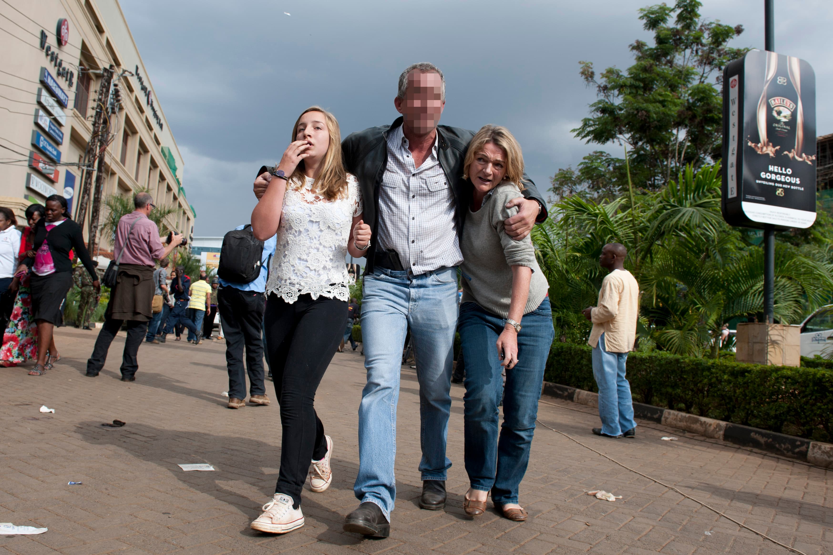 An off duty SAS soldier with his handgun saves two women trapped inside Westgate Mall on September 21, 2013 in Nairobi, Kenya. AN off-duty SAS soldier is being heralded as a hero following reports he saved 100 adults and children from the Nairobi shopping