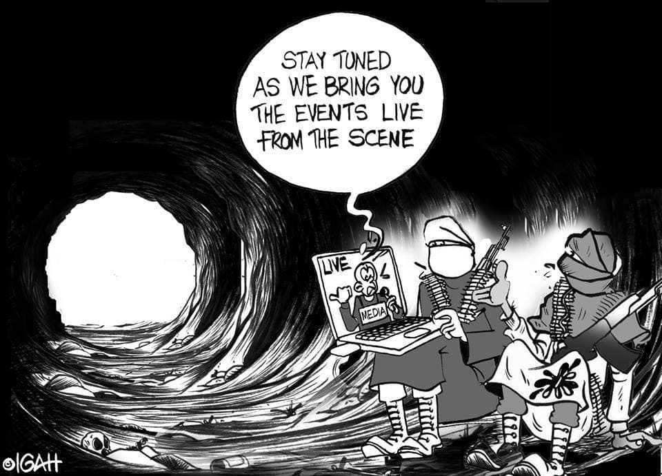 Kenyan cartoonist Igah Smuigai with a cartoon 'live' from the Westgate Mall.