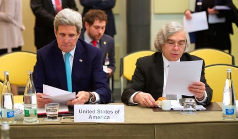 US Secretary of State John Kerry and US Energy Secretary Dr. Ernest Moniz sit side-by-side on April 2, 2015, in Lausanne, Switzerland, before the P5+1 member nations held a meeting to discuss ongoing nuclear negotiations with Iran.