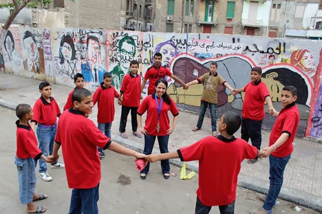 Morning circle time with Aya Hijazi and some of the children the group works with outside the Belady Foundation.