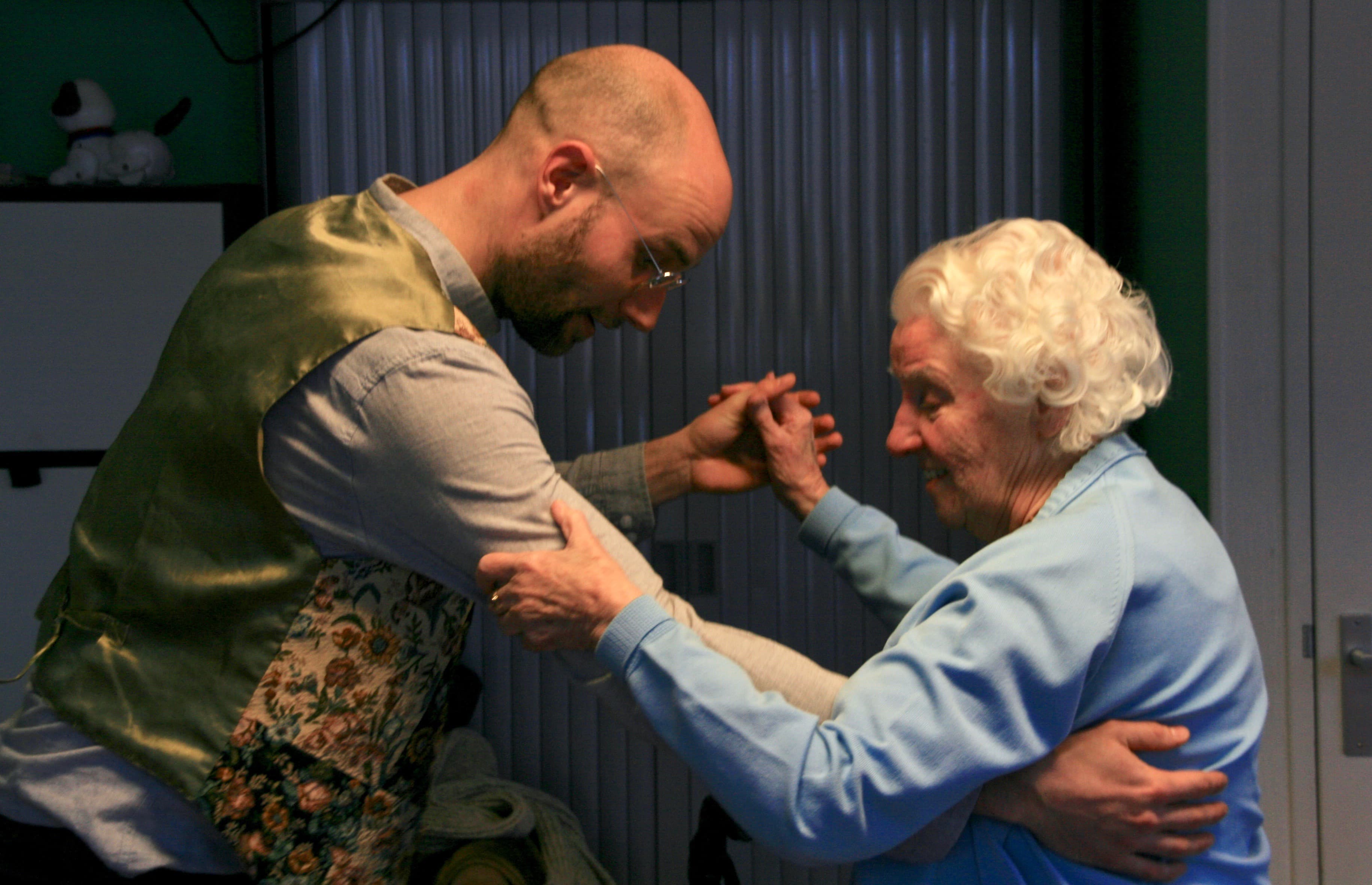 Rie van de Mueren (r) used to be a professional ballroom dancer. She's with Dieuwer Duijf at the Music Salon, which holds dance parties for the elderly in north Amsterdam.