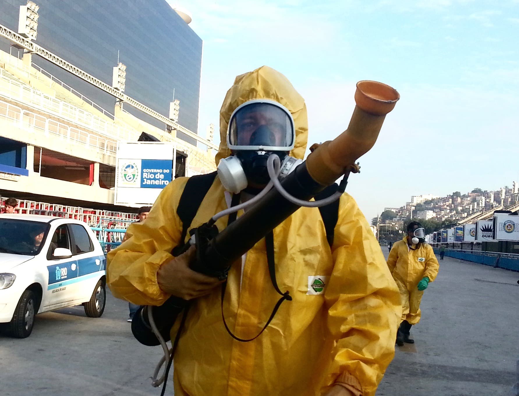 A health worker stands in the Sambadrome as he sprays insecticide to combat the Aedes aegypti mosquitoes that transmit the Zika virus, in Rio de Janeiro. Inspectors are spraying the insecticide around the Sambadrome, the outdoor grounds where thousands of