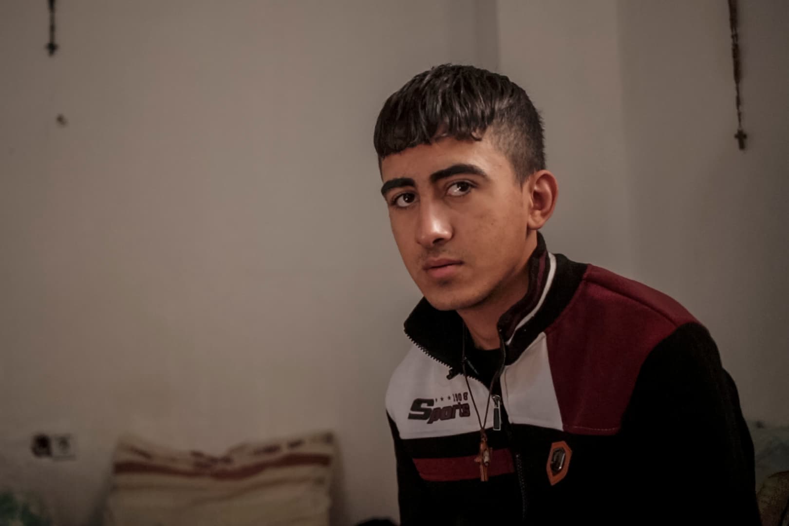 Ismail al-Kanon is interviewed in his home in Erbil, Iraq, on Nov. 25.