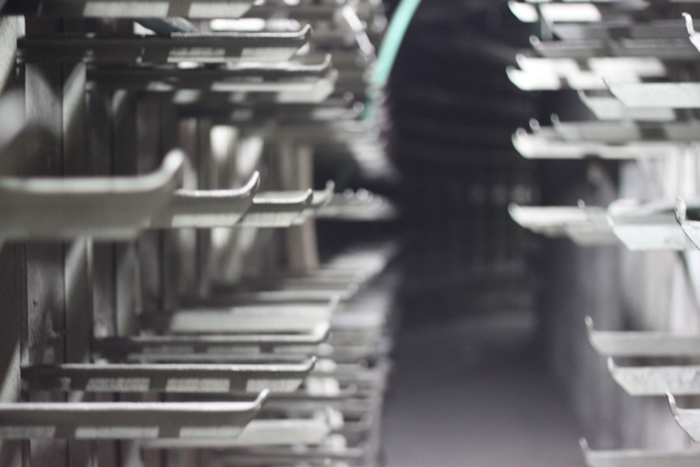 A narrow tunnel inexplicably flanked by metal claws deep inside Tel Aviv's Central Bus Station.