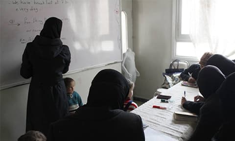 A class at a women's center in Ghouta.