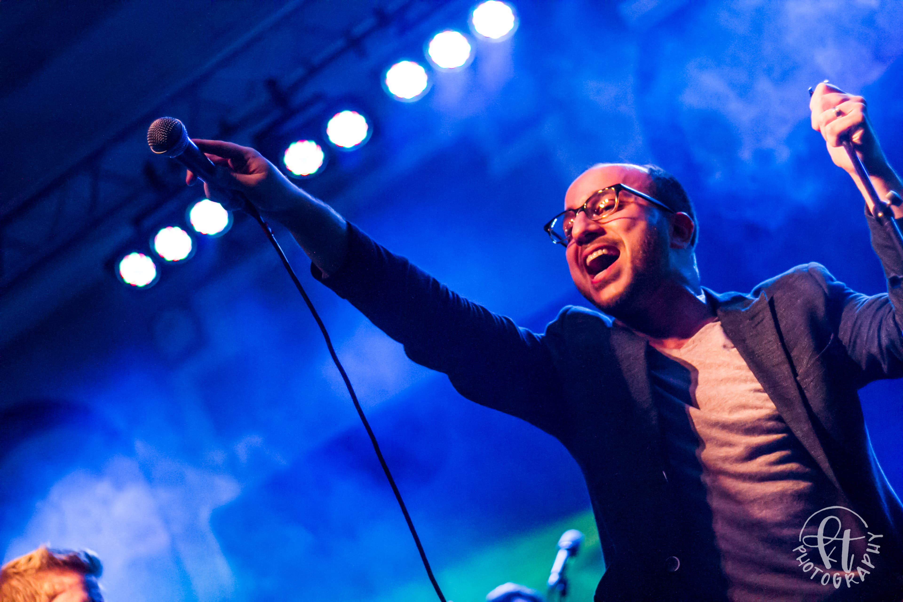 Bassel Almadani on stage with the Supernaturals