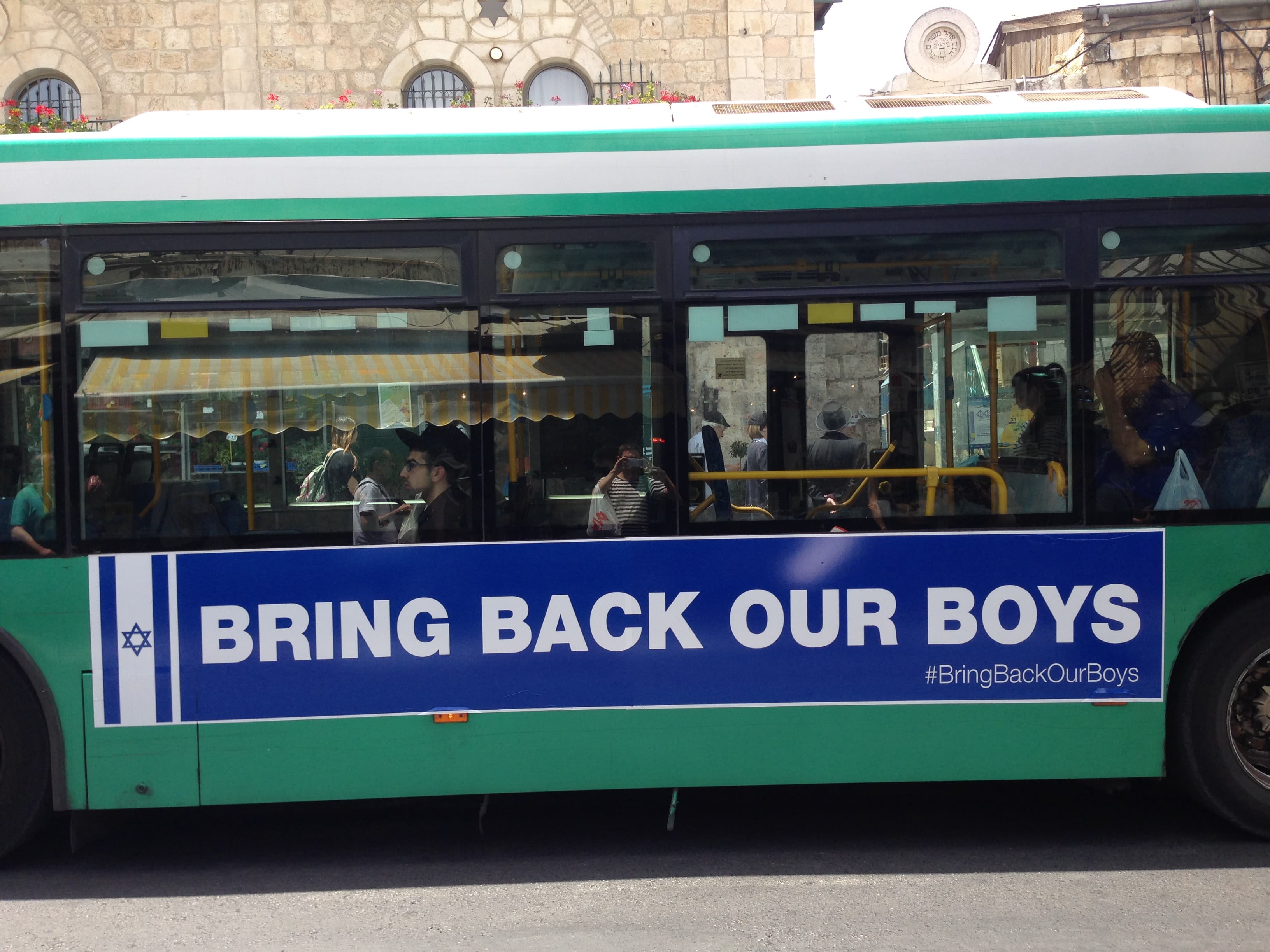 Israel’s largest bus company plastered buses with big ads featuring the #BringBackOurBoys slogan.