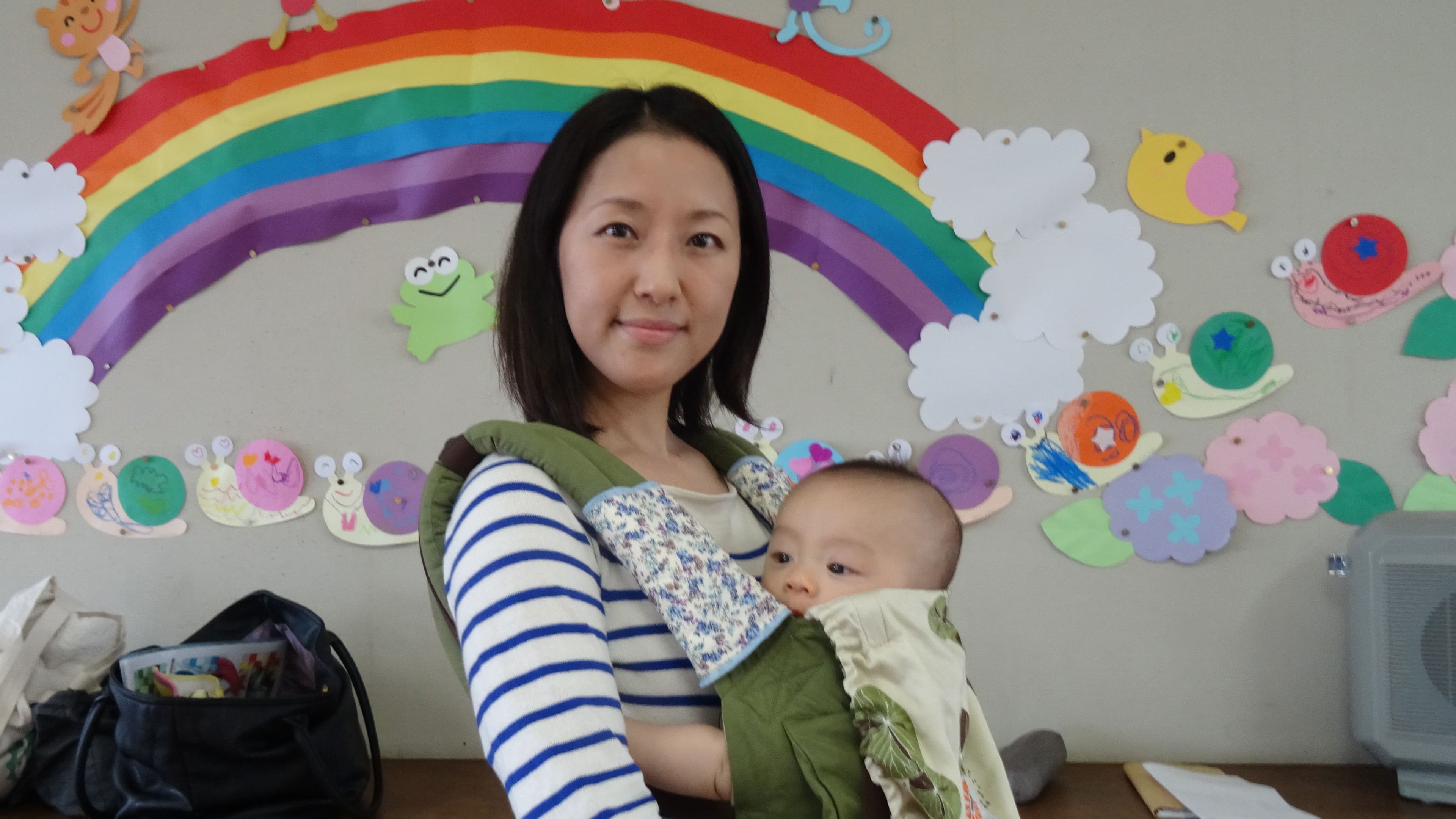 Aya Kanihara and her son Ayumu. Kanihara is taking maternity leave from her job in a Hiroshima office.