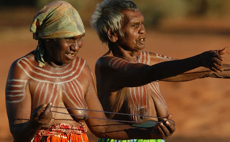 Aboriginal women from the remote Central Australian community of Ampilatwatja performing at a public ceremony in 2010 to protest against the Northern Territory intervention.
