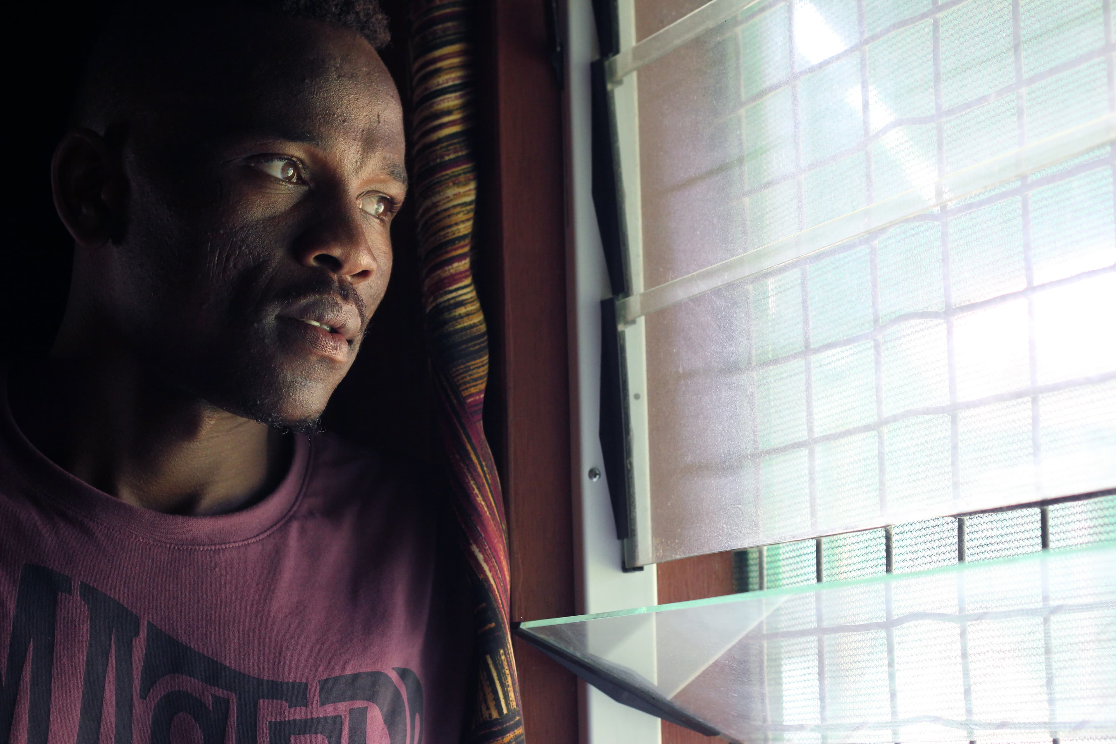 Sudanese asylum seeker Abdul Aziz Muhammed, who has been stuck in a Australian-funded immigration detention camp on a remote island in Papua New Guinea for nearly four years. His only hope is that the Obama-era agreement to resettle refugees like him to t