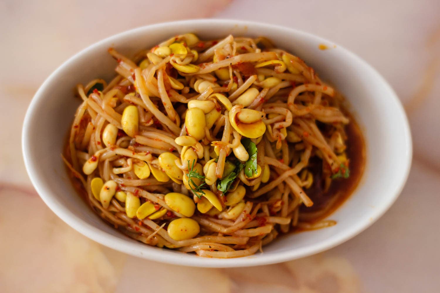 A Korean bean sprout dish, kongnamul muchim), gets an Uzbek spin (fresh cilantro) at Cafe at Your Mother-in-Law.