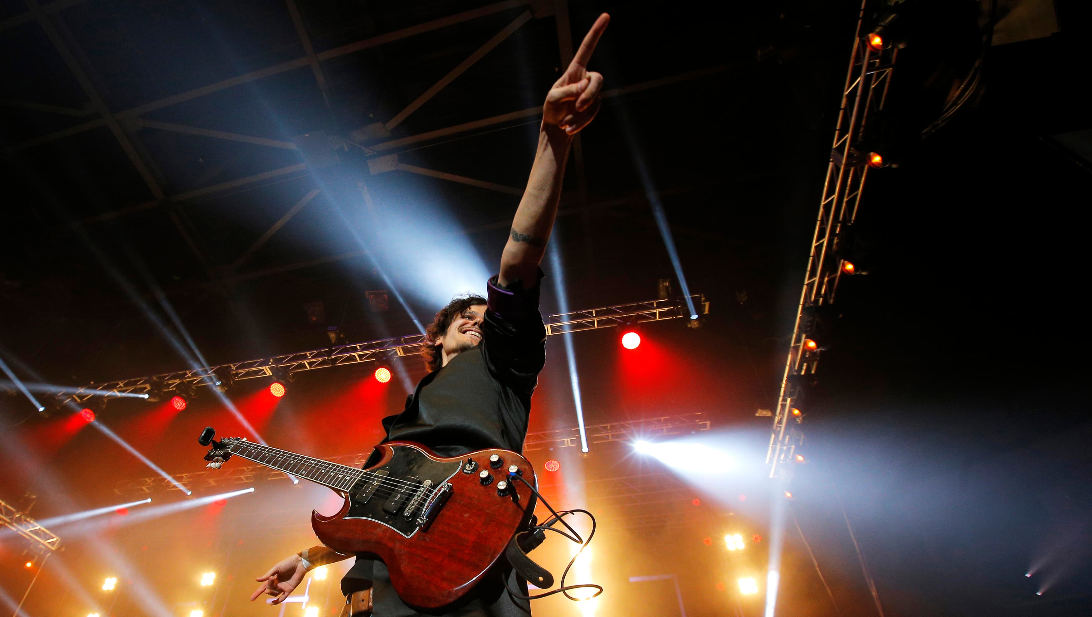Graduating student Sebastian Fernandez performs a Led Zeppelin song at the Berklee College of Music Commencement Concert in Boston.