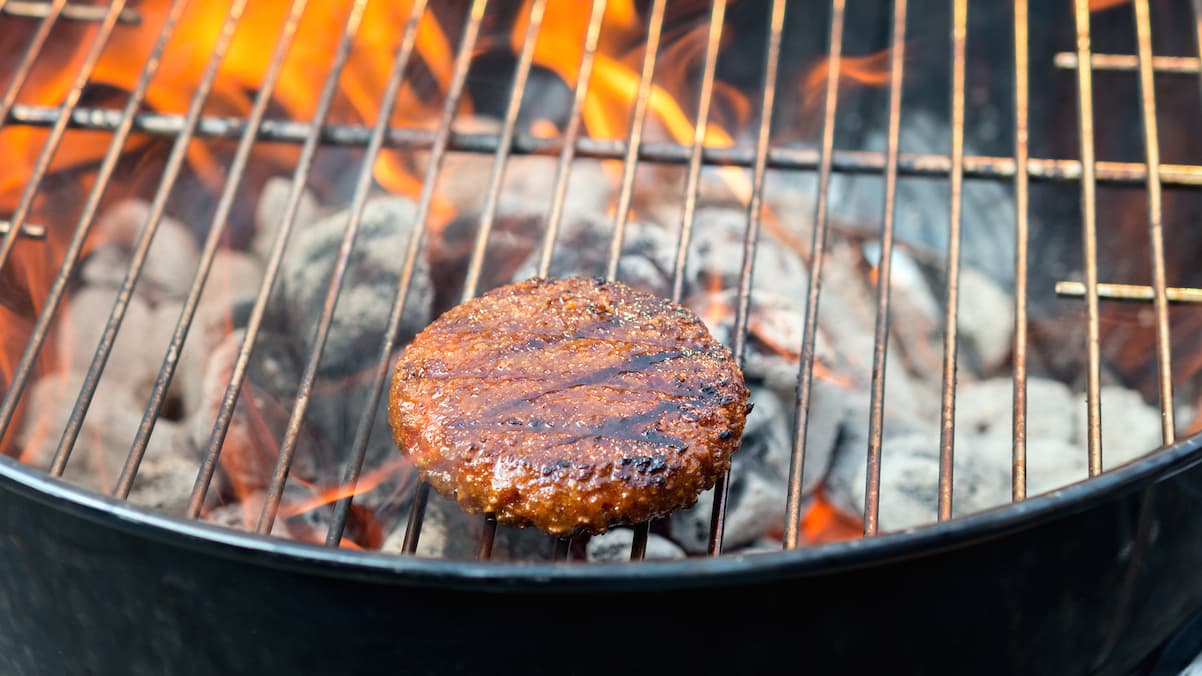 The Beyond Burger on a grill.