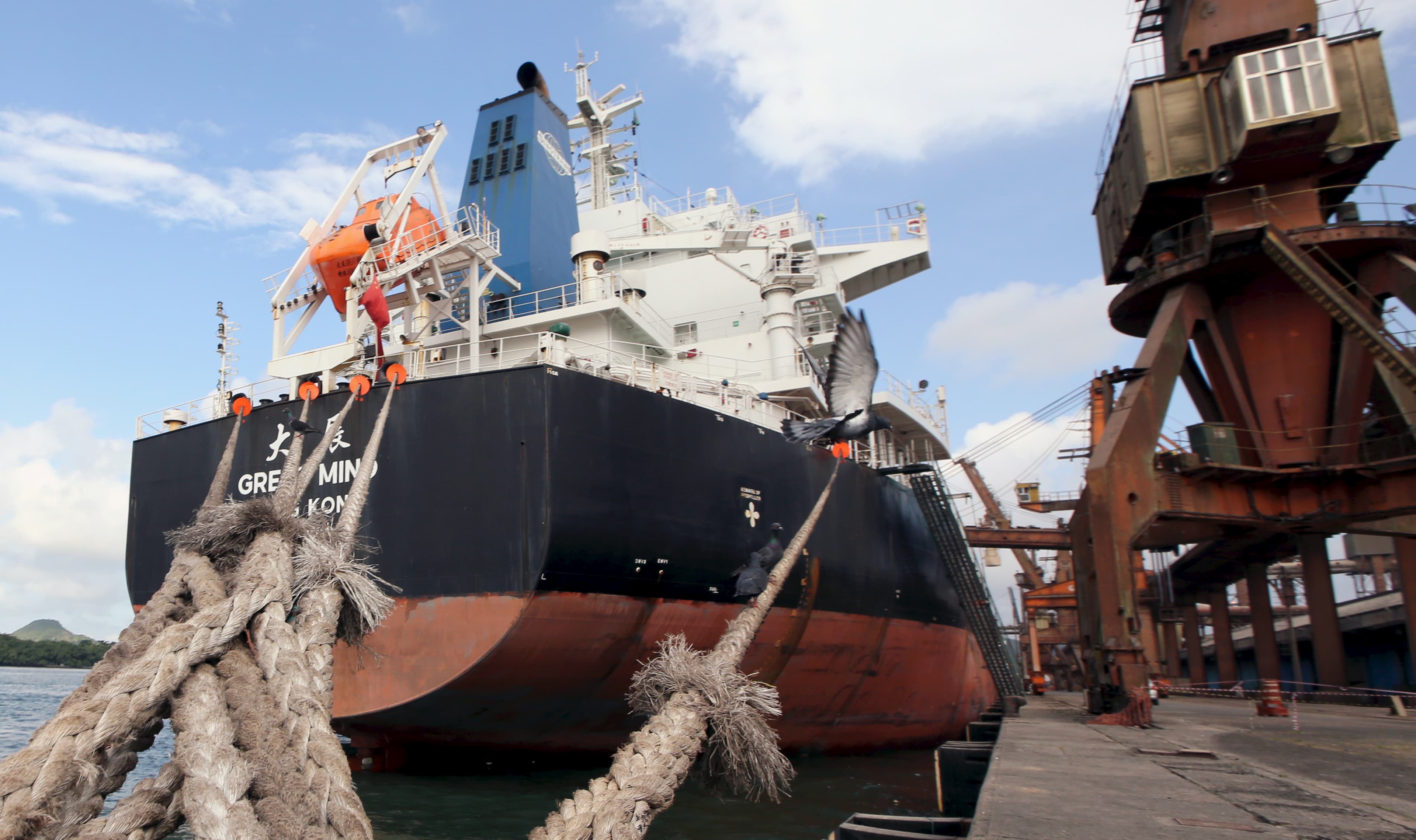 A Chinese ship is anchored at Port of Santos in Brazil while being loaded with soybeans. May 19, 2015.
