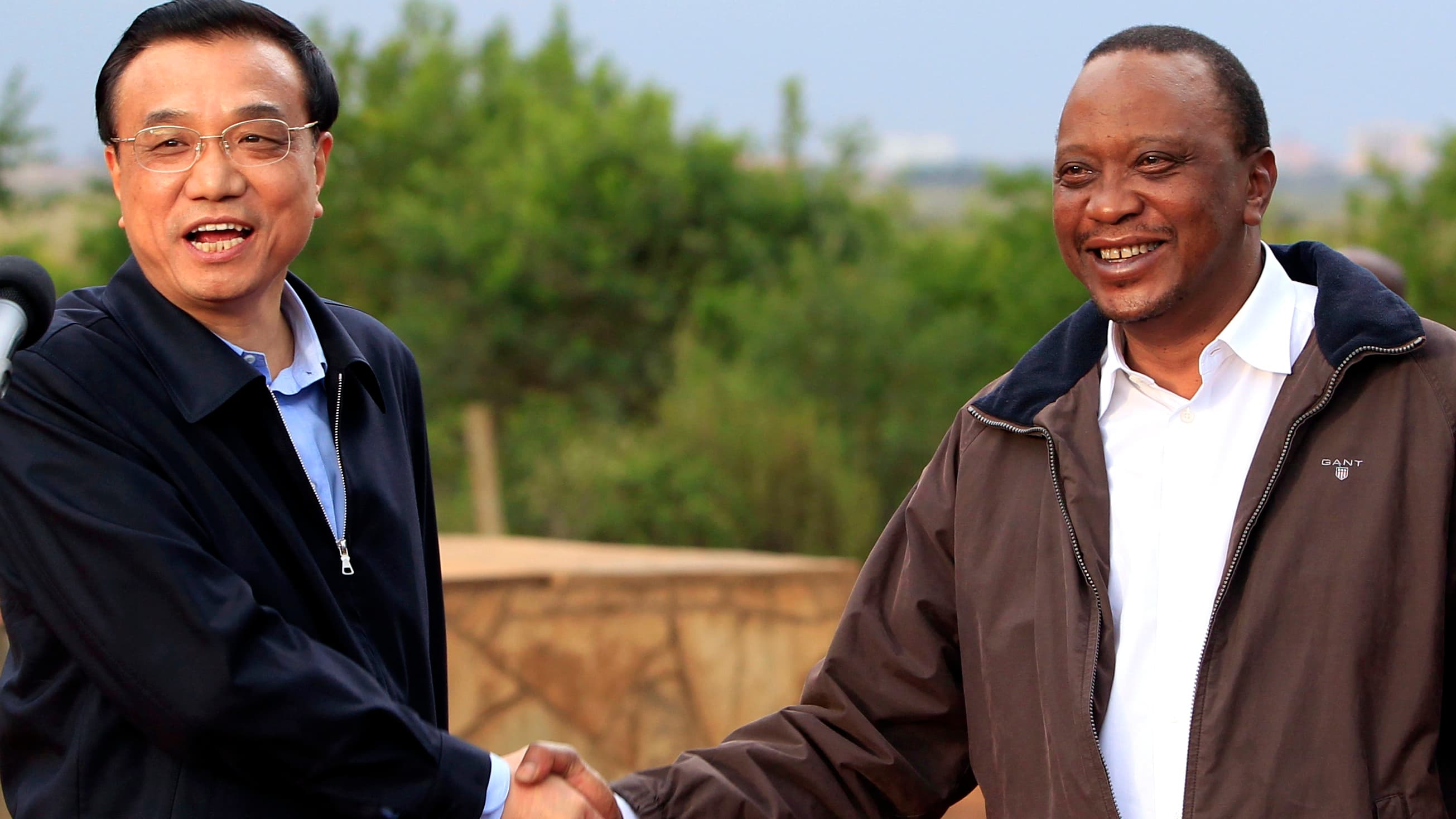 Kenya and China have developed a closer economic relationship in recent years. Chinese Premier Li Keqiang (left) shakes hands with Kenyan President Uhuru Kenyatta in May 2014.
