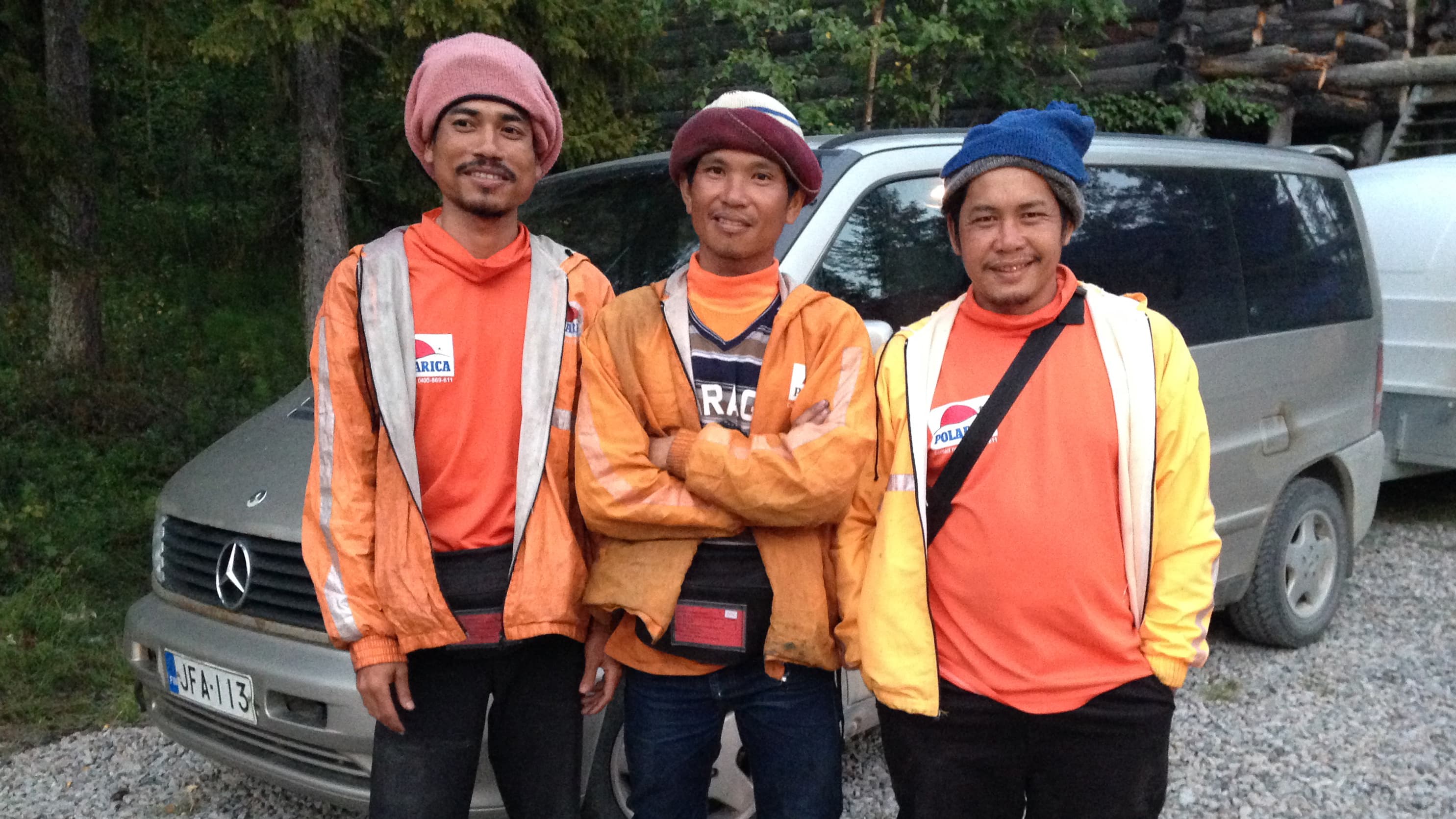 Berry pickers in Finnish Lapland from the province of Ubon Ratchathani in northeast Thailand. The balaclavas keep the gnats, biting flies, and mosquitoes away.