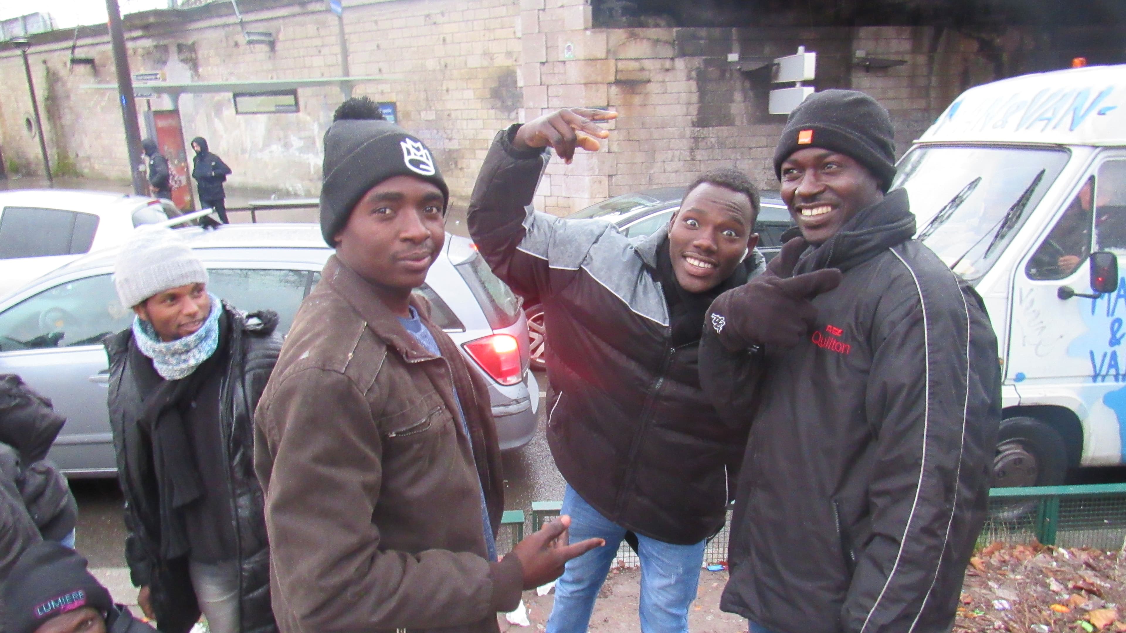 Abdallah Khalil (right) with friends in northern Paris. Khalil arrived in Paris in December and hopes to get asylum in France.