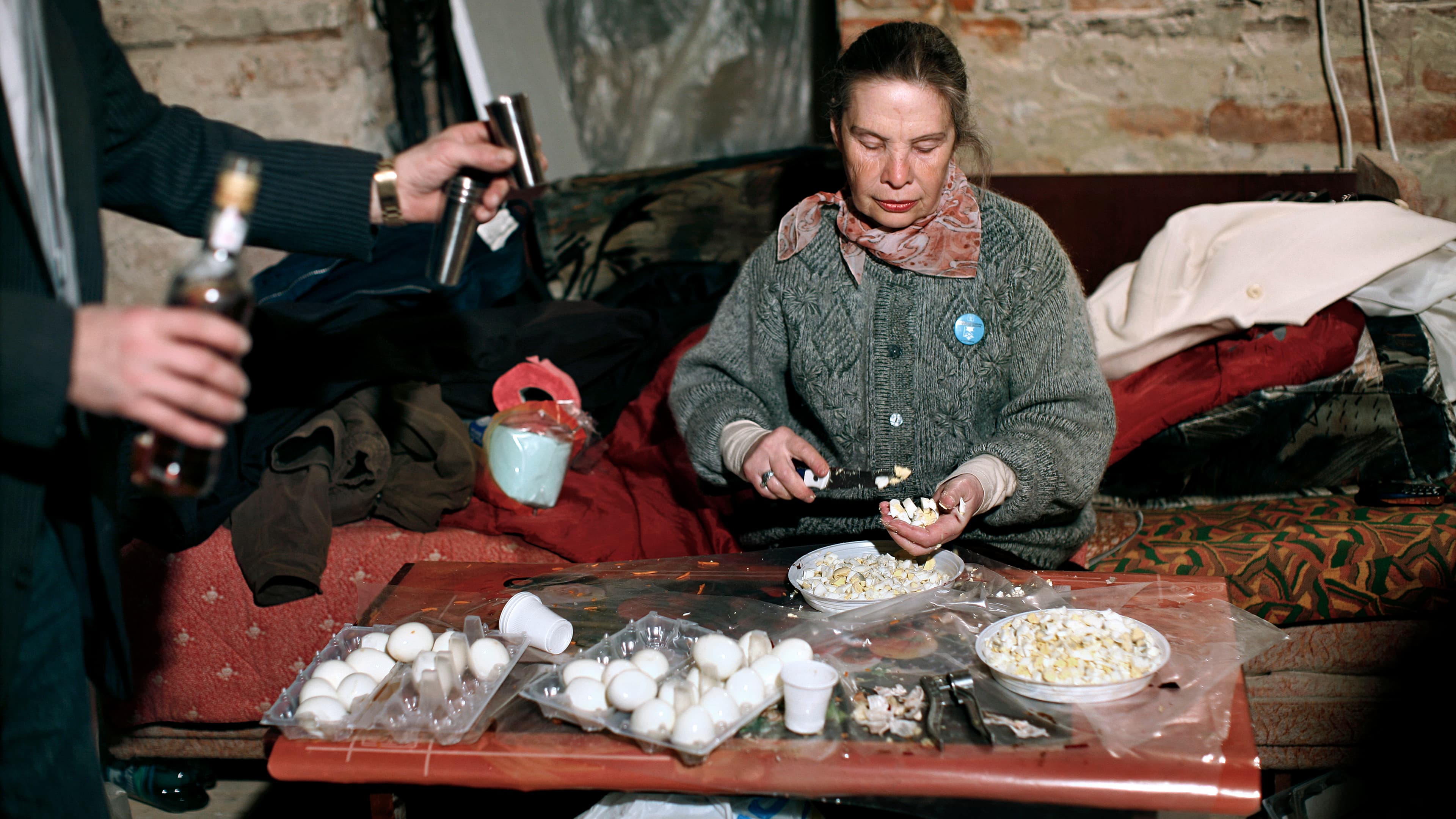 Egg salad for Passover in Drohobych, Ukraine. Loli Kantor remembers this method of cutting an egg in the palm of your hand from her youth. It's part of the Jewish life that she documented in Ukraine.