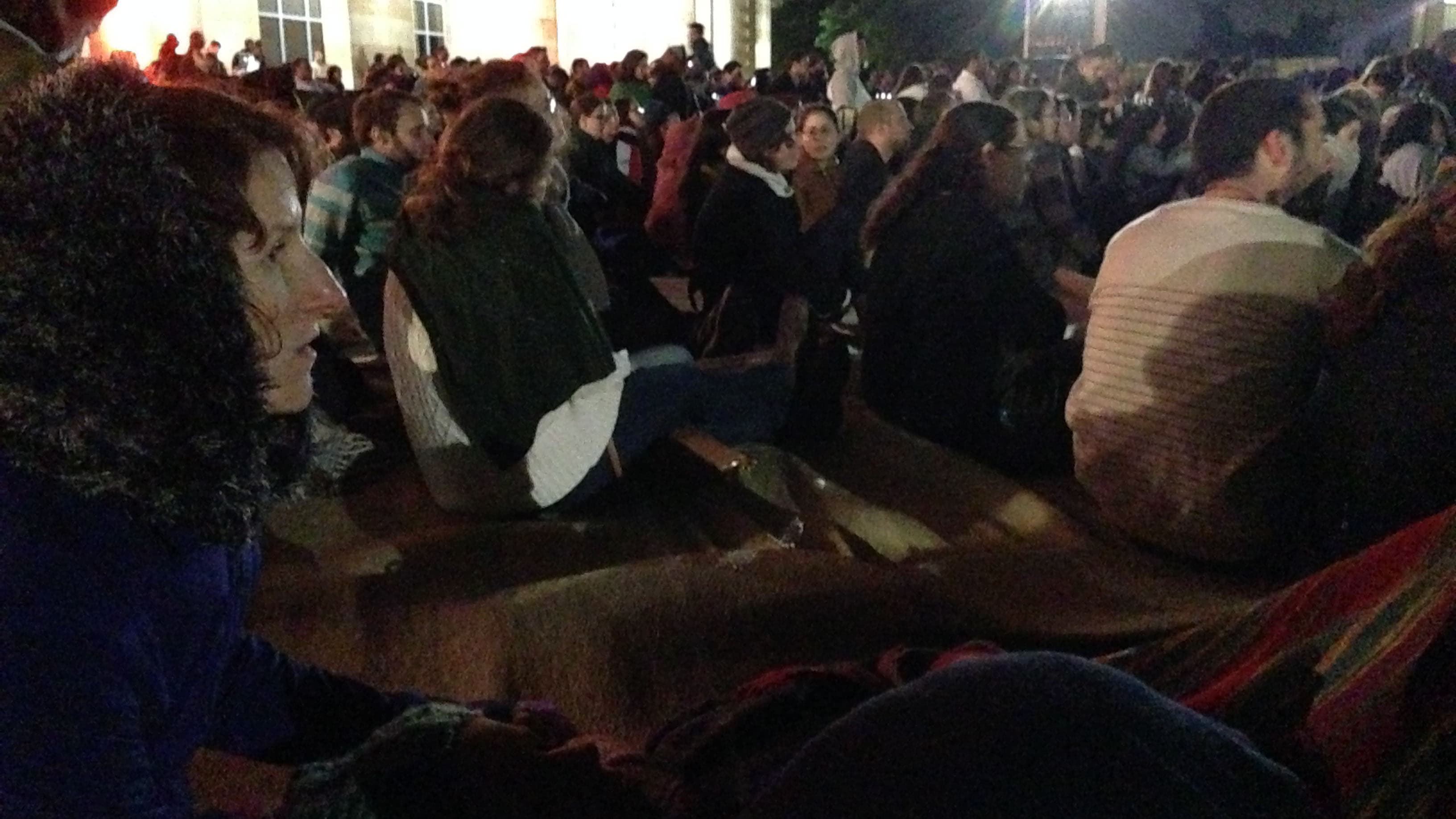 At a Memorial Day gathering in front of the city hall in Jerusalem. People come together to sing songs of loss and remembrance.