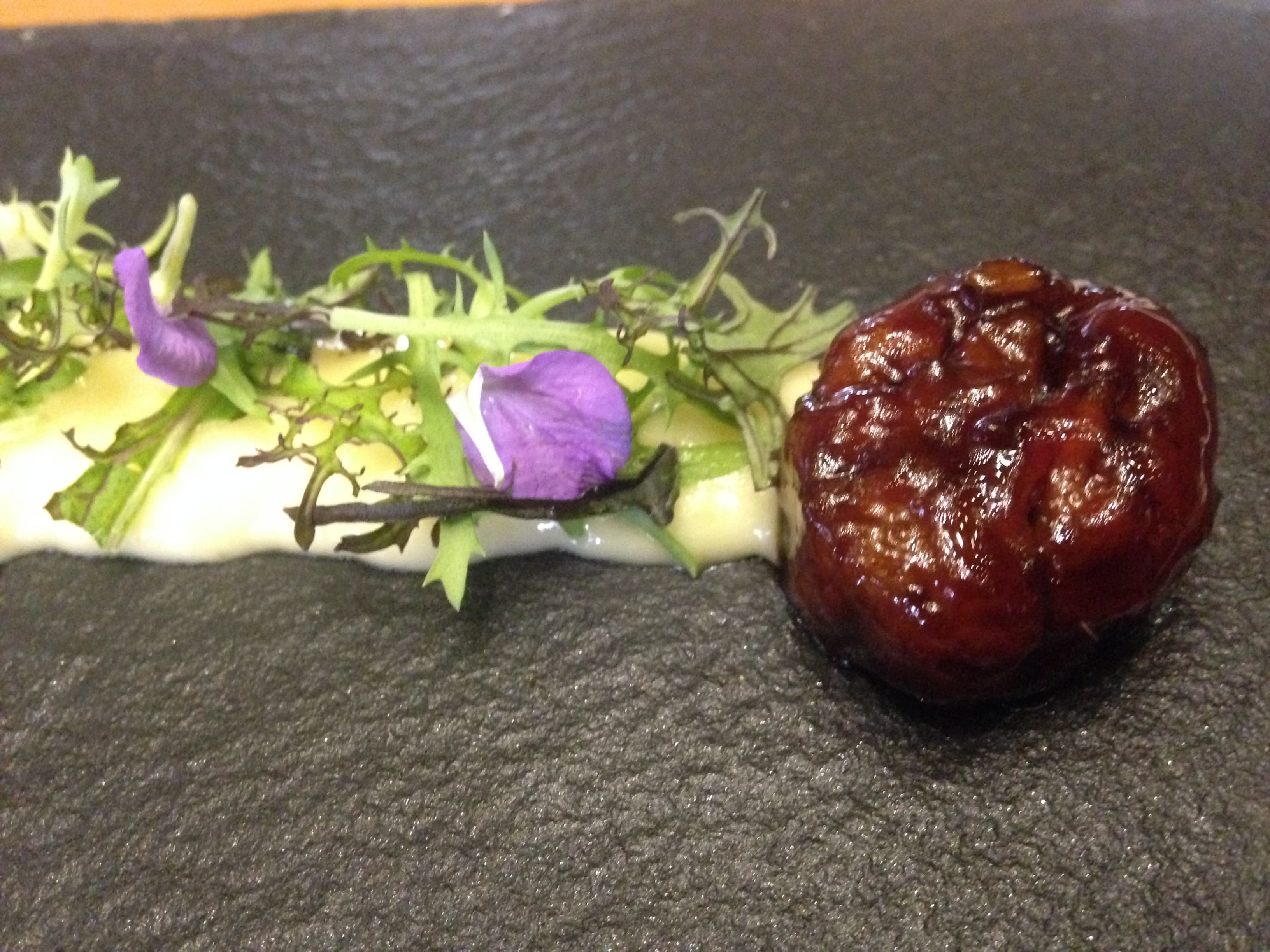 Cuy (guinea pig) with yucca cream at Maido, a restaurant in Lima, Peru