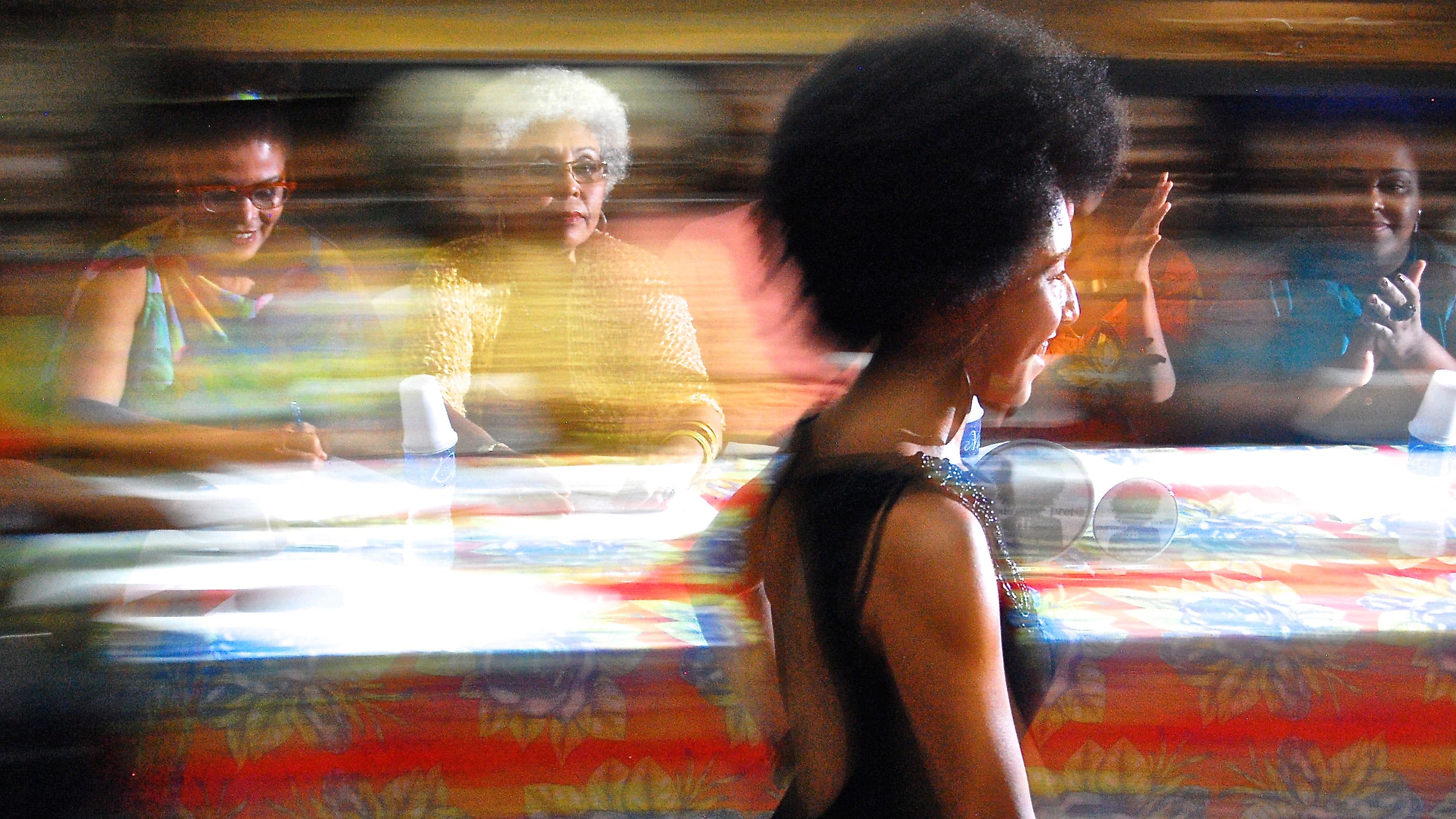 Jack Andrade of Rio de Janeiro parades by a panel of judges for Miss Black Power Brazil. Judges included writers, designers, a university professor, and a model, who evaluated the candidates according to “diverse criteria, including political responsibili
