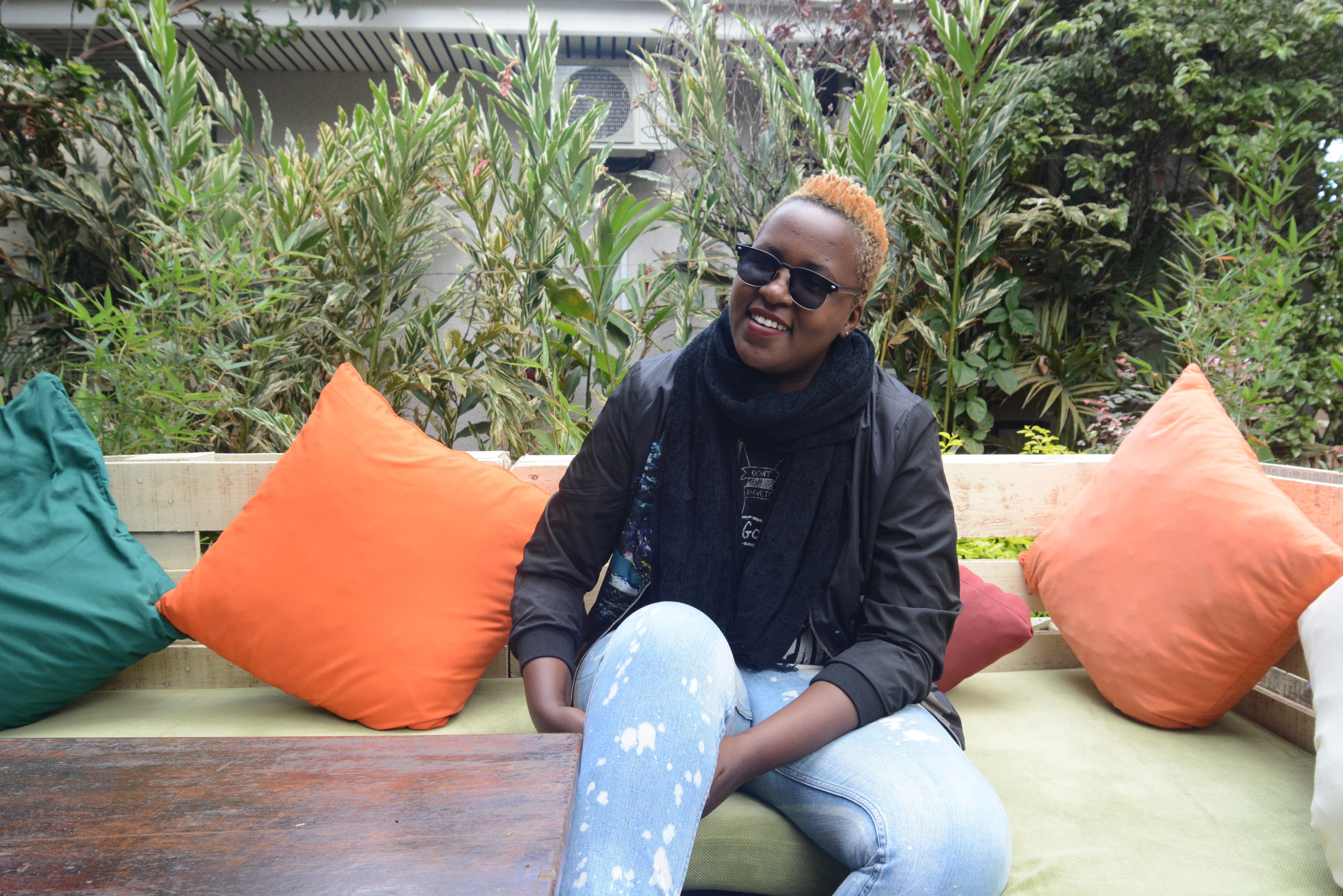 Ugandan rapper Keko relaxing in a cafe in Kampala.