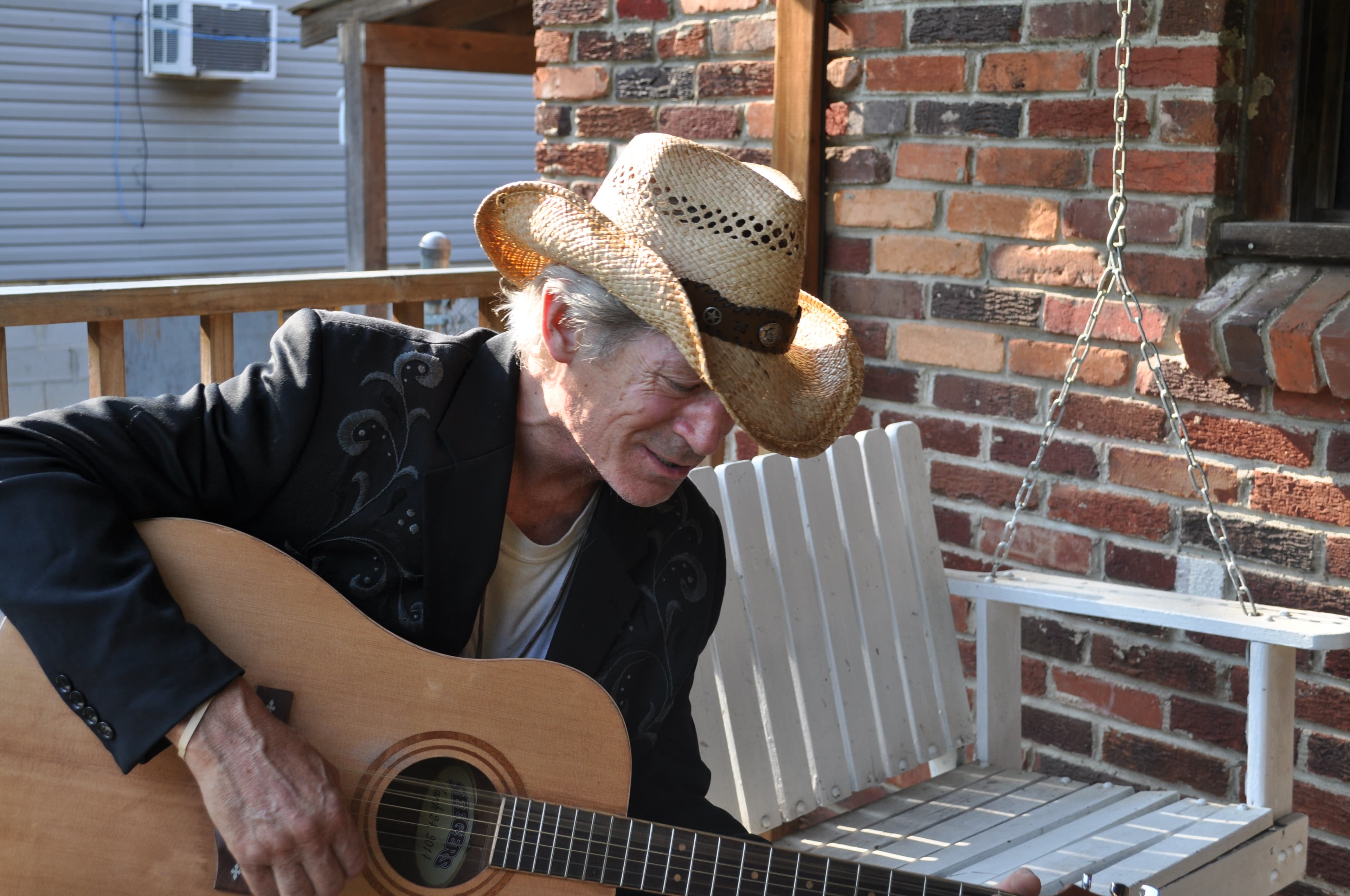 Doug Seegers on the porch of his house.
