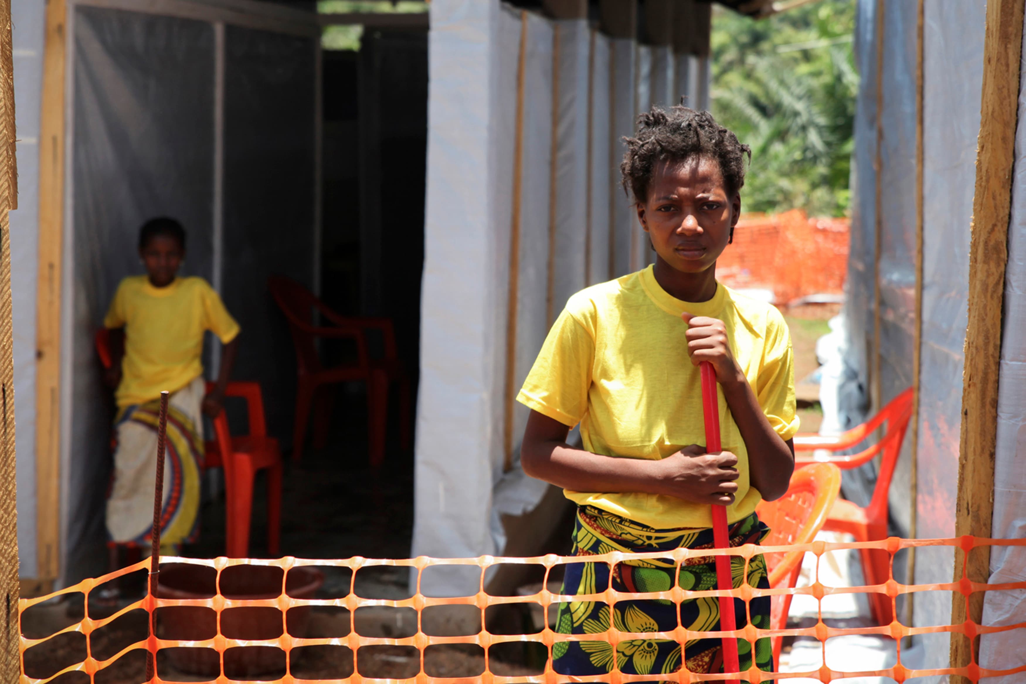 Rose Komono poses for a picture at a health clinic after overcoming the Ebola virus in Gueckedou, Guinea. In April, Komono became the first victim to have beaten the disease in the region of Gueckedou, which has borne the brunt of the deaths in the impove