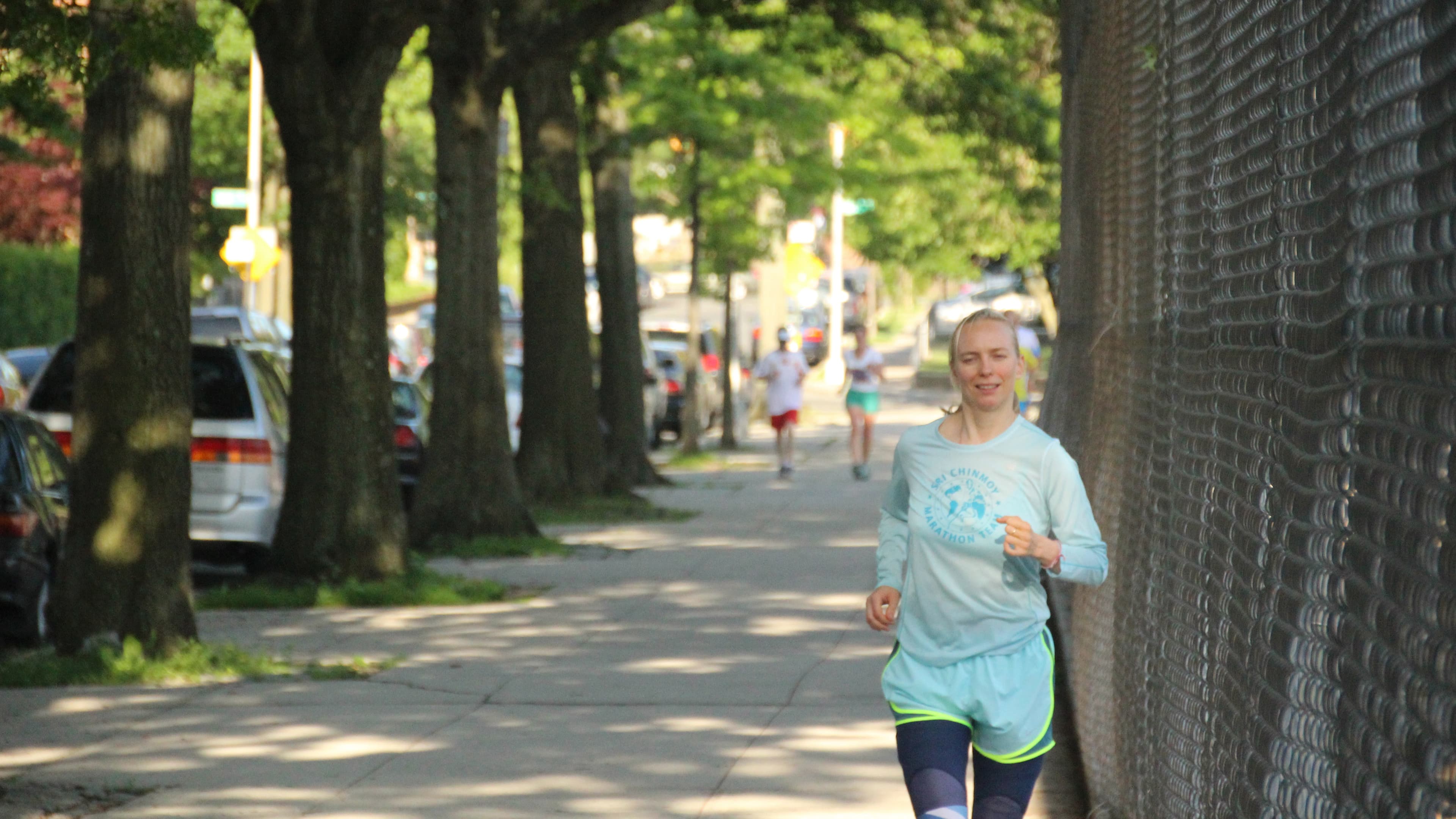 Jayasalini Olga Abramovskih from Russia makes a lap on the first day of the Self-Transcendence 3100 mile race. Runners alternate the direction they go around the block each day to avoid uneven wear on their bodies.