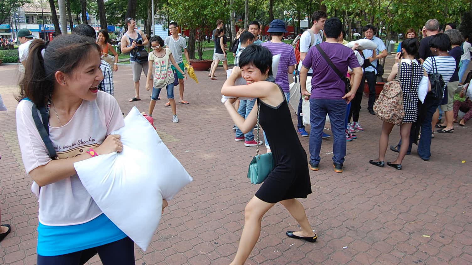 The fight hasn’t even started, but some pillow fighters can’t wait to take a friendly swing at their friends.