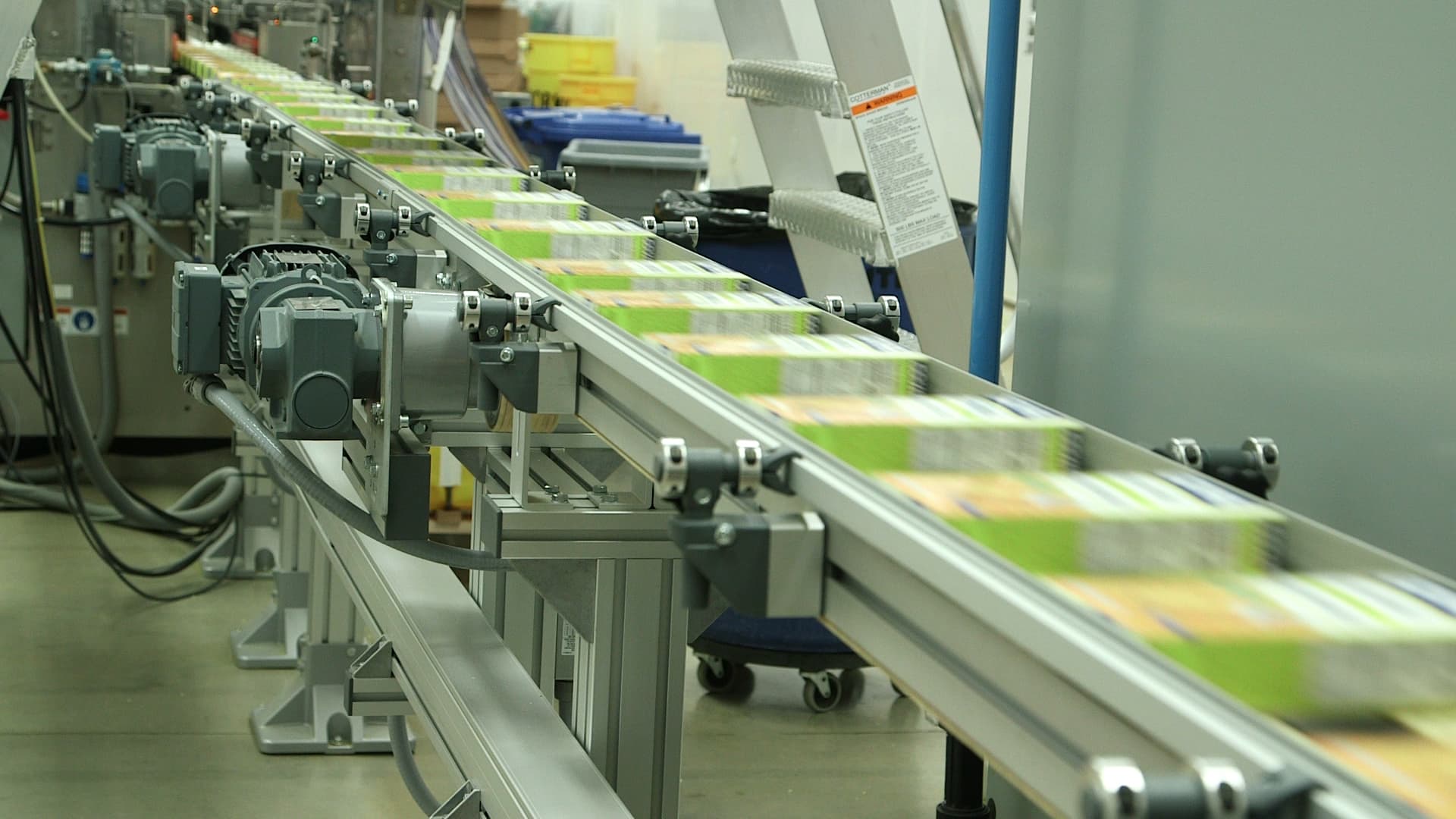 Boxes of rice stream past on a food processing machine at Goya in New Jersey.