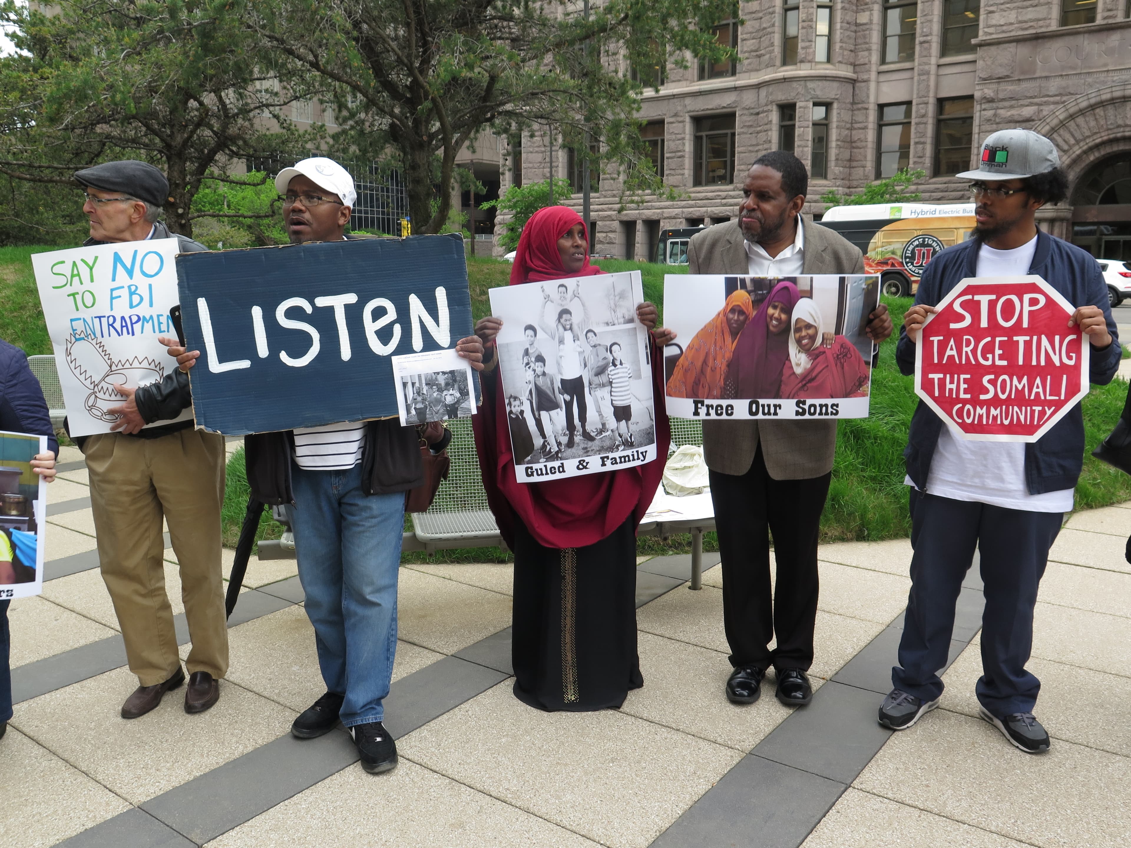 Supporters of three young Somali Americans on trial for plotting to join ISIS in Syria.