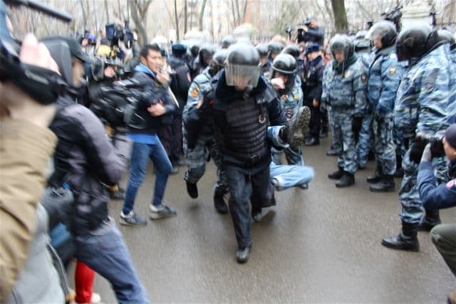 Russian OMON security forces detained dozens outside a Moscow courthouse, where anti-Putin protestors were sentenced to up to four years in prison.