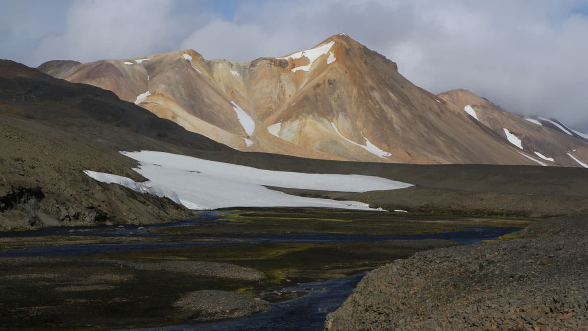 A butterscotch mountain surges skywards in Iceland.
