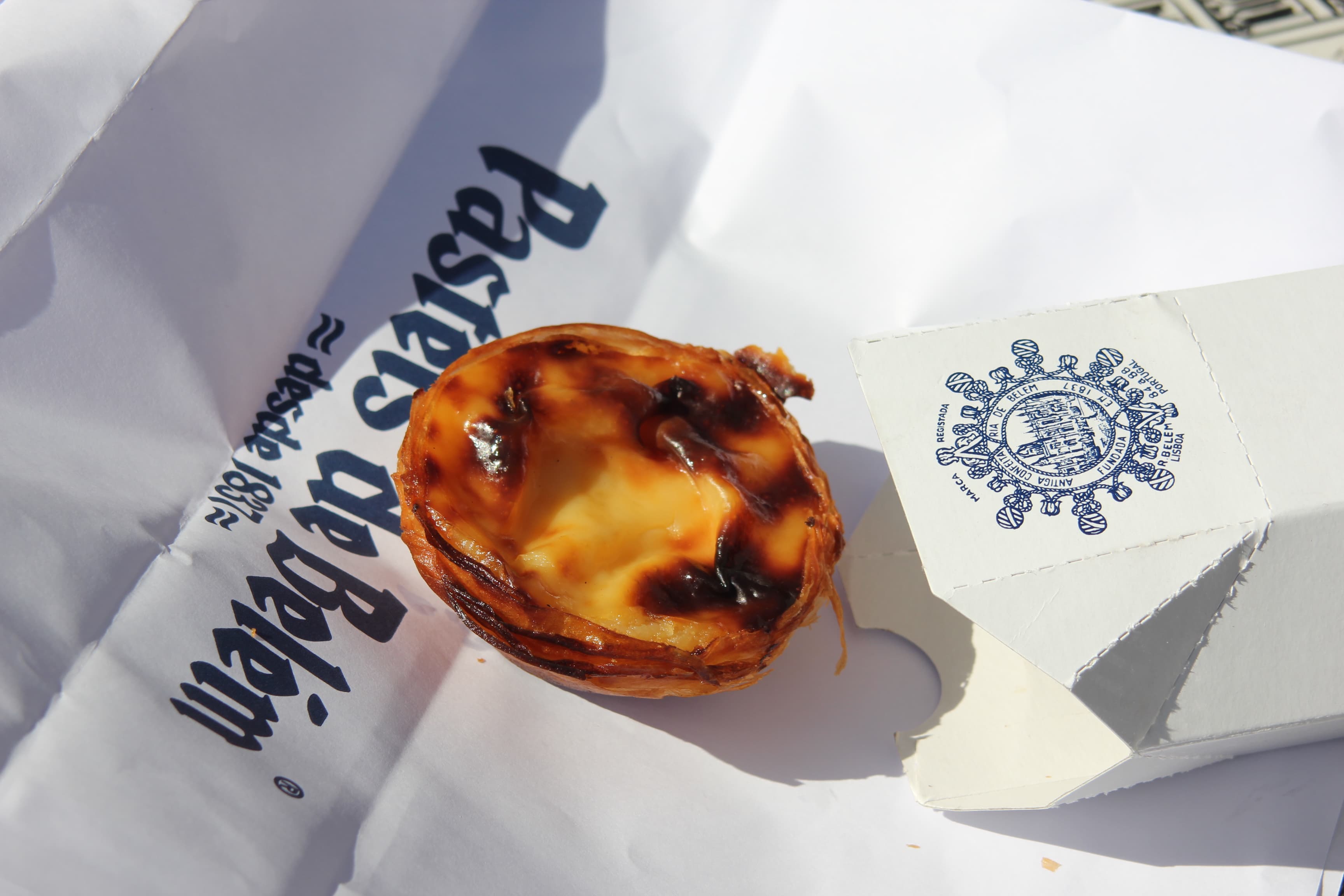 Pastéis de nata (singular: pastel), the custard tarts that are the regional pastry of the Lisbon area, as served up at Pastéis de Belém since 1837.