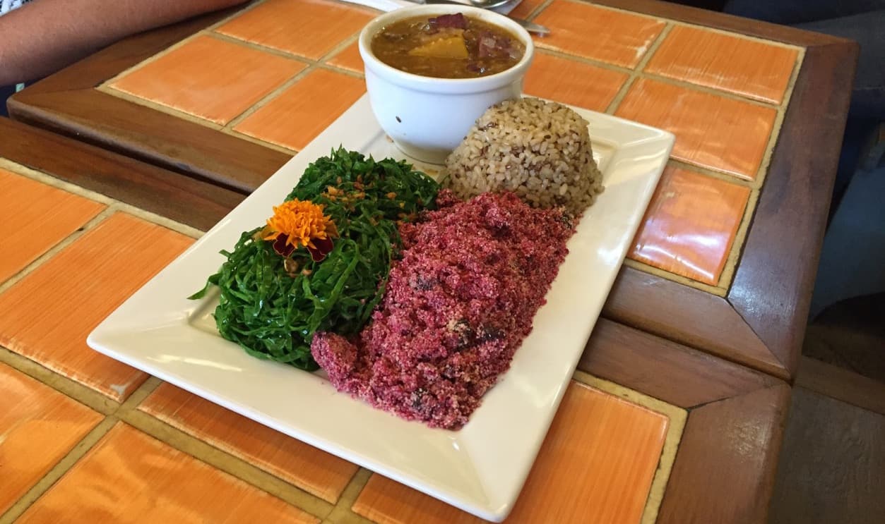 The vegan feijoada at .Org Bistro is served with beet farofa (toasted manioc flour), sautéed collard greens and rice.
