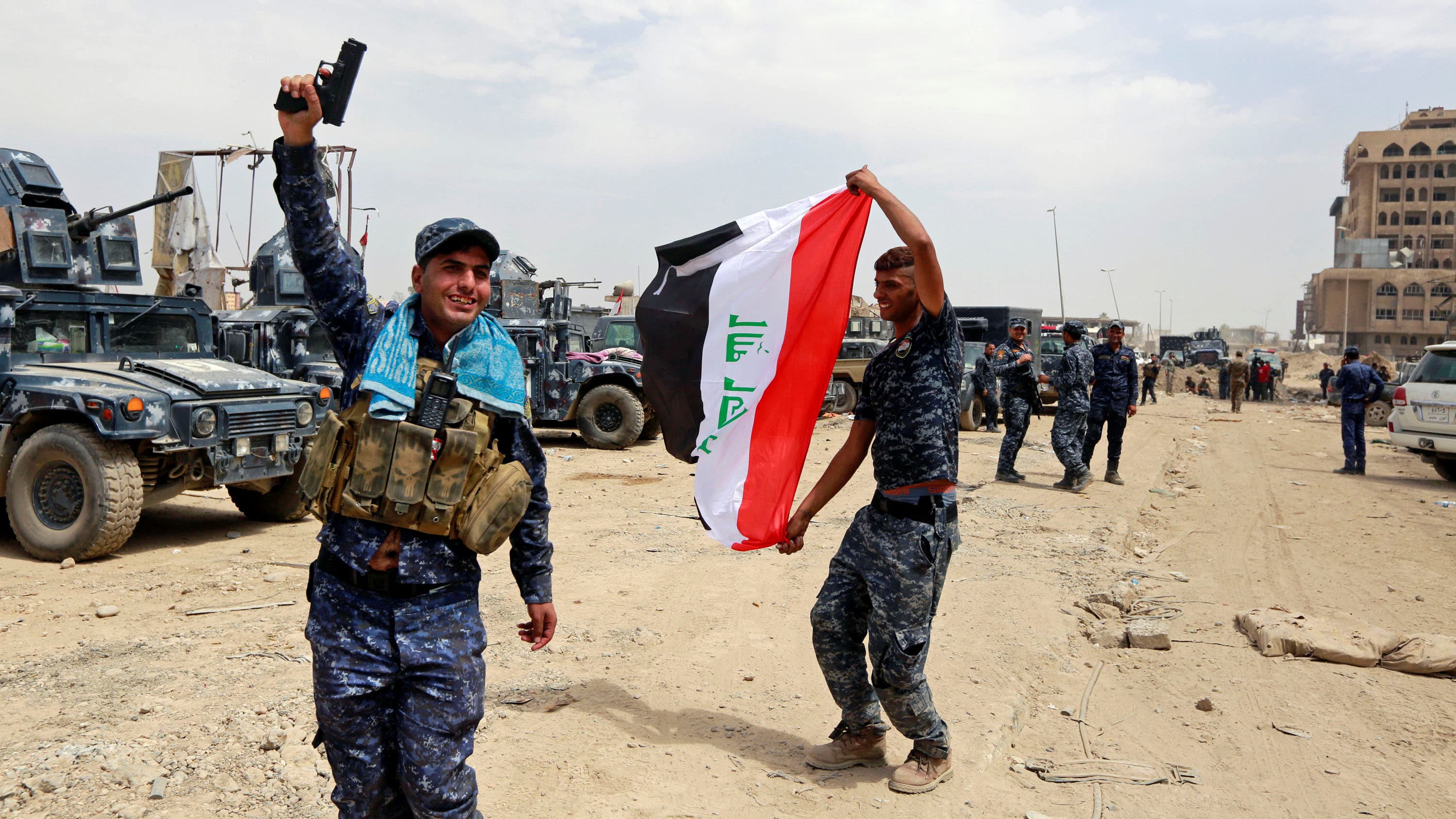 Iraqi Federal Police celebrate in the Old City of Mosul, Iraq on July 8, 2017.