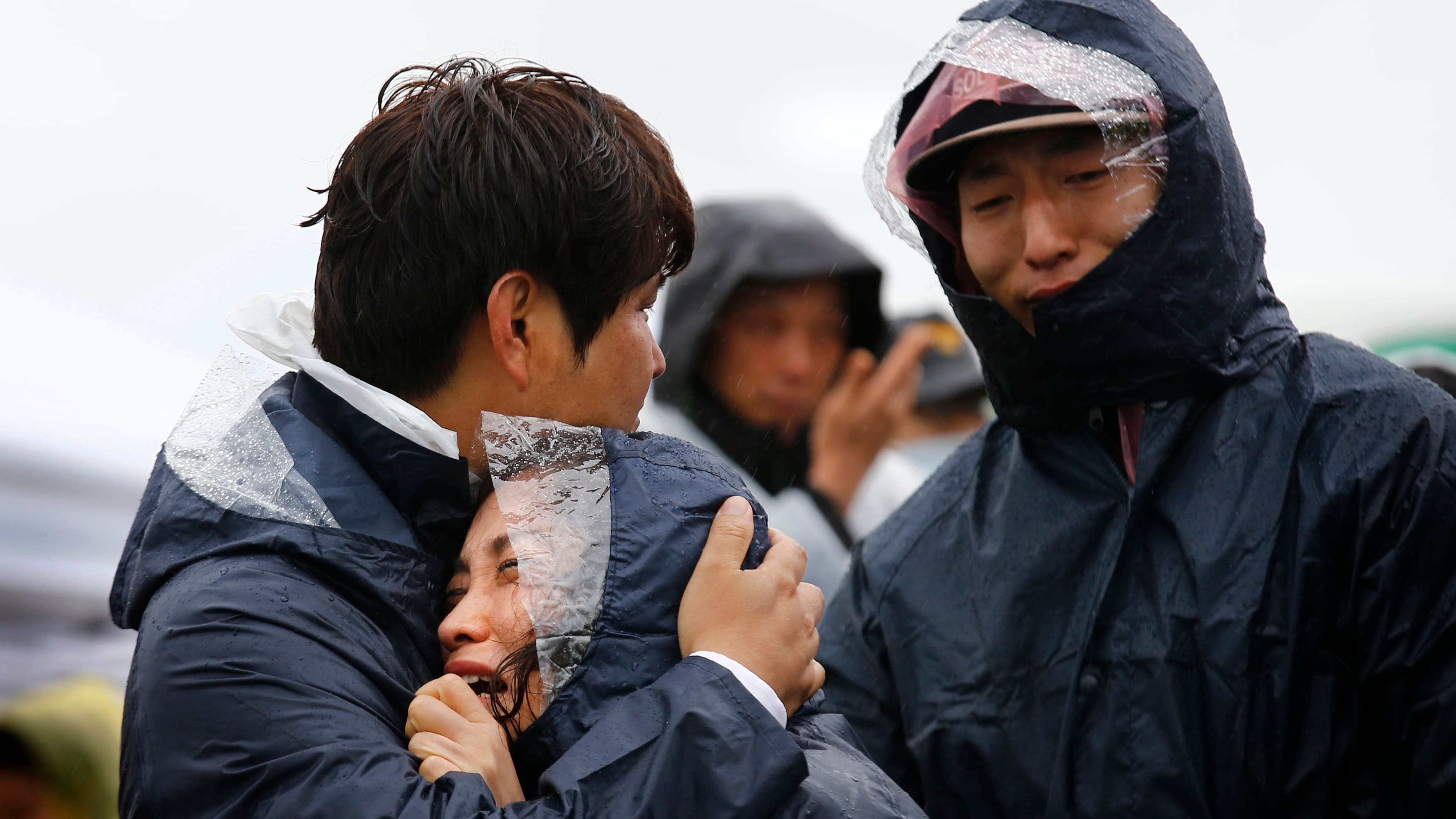 Family members of passengers missing on the overturned South Korean ferry "Sewol" at the port in Jindo.