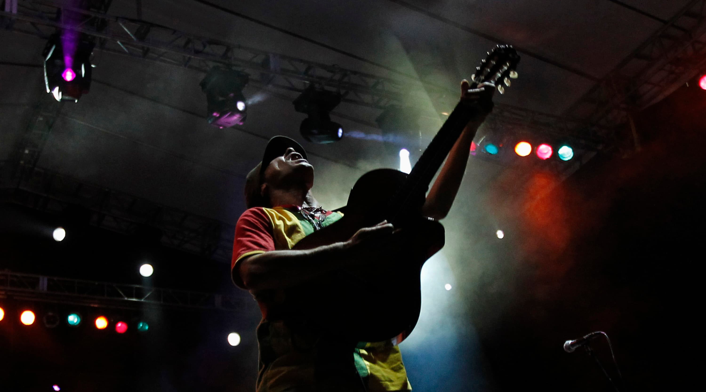 Singer Manu Chao performs during a free concert in Caracas, Venezuela on March 23, 2012.