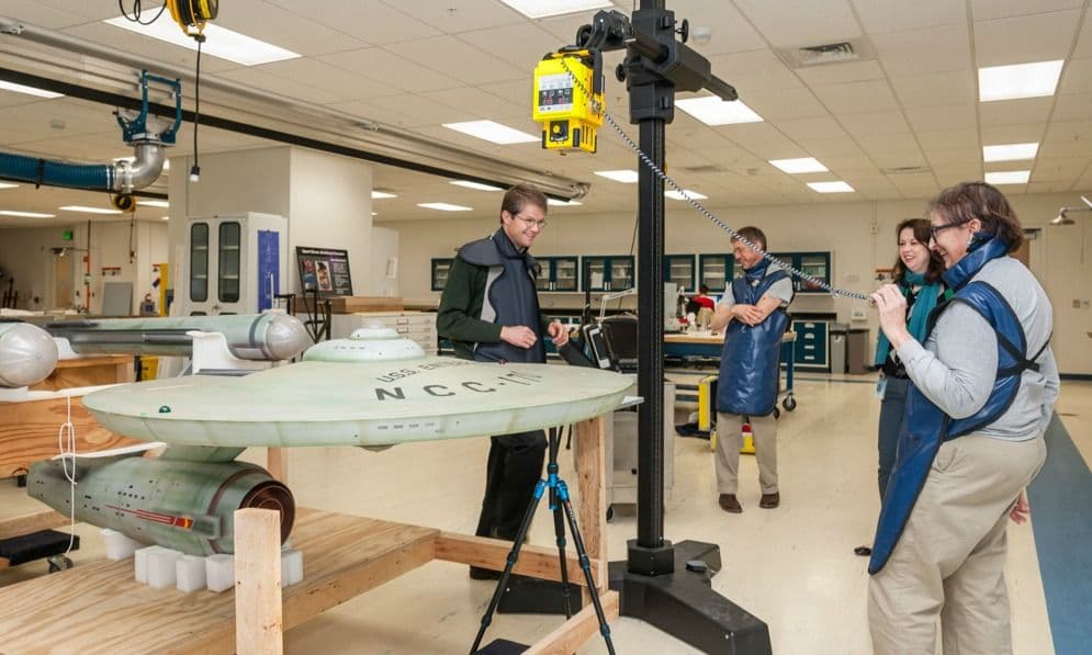 Conservator Ariel O’Connor uses X-ray fluorescence spectrometry to determine what metal alloy was used to construct the port engine of the Enterprise model