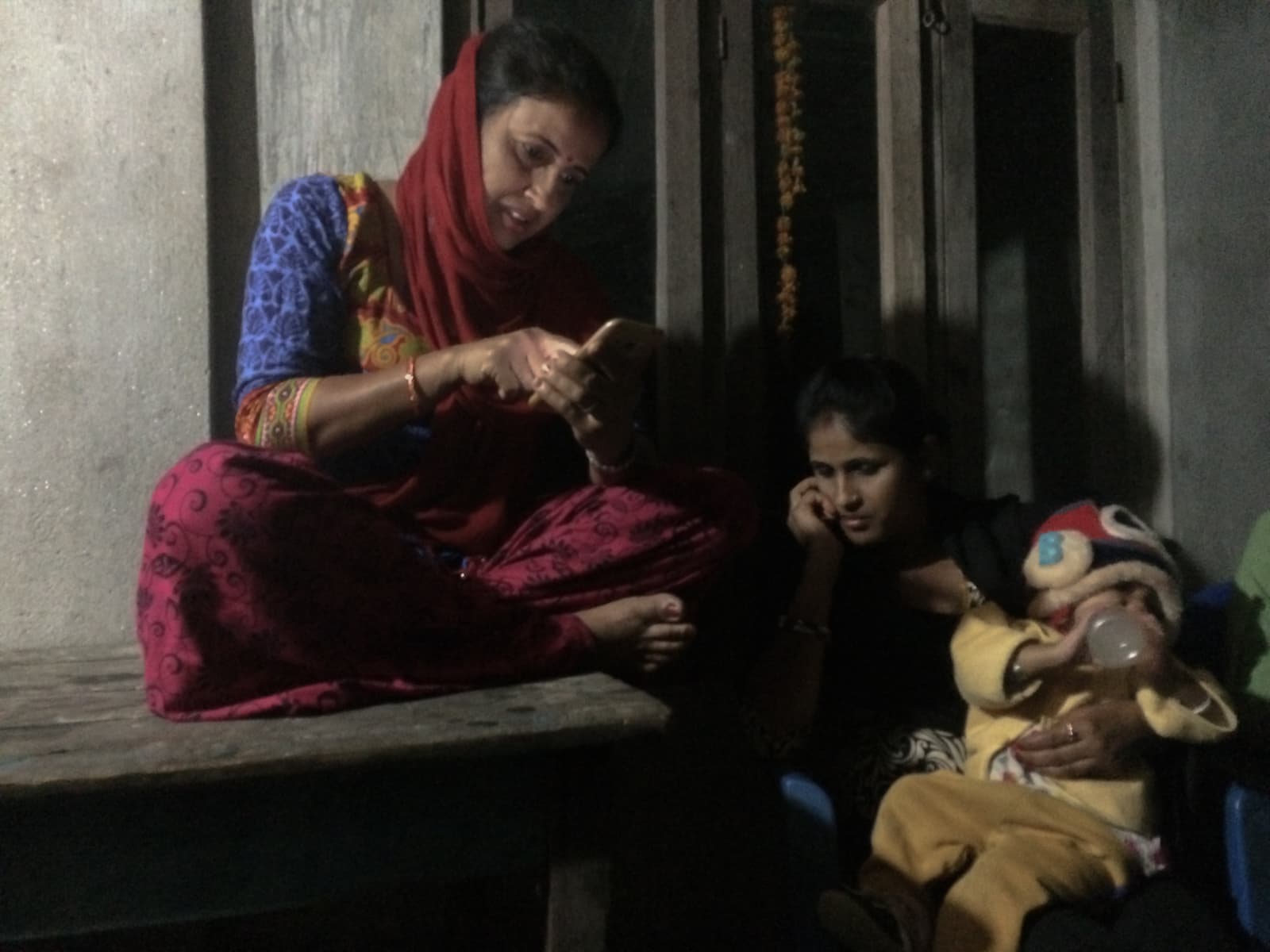 Woman looks at her phone