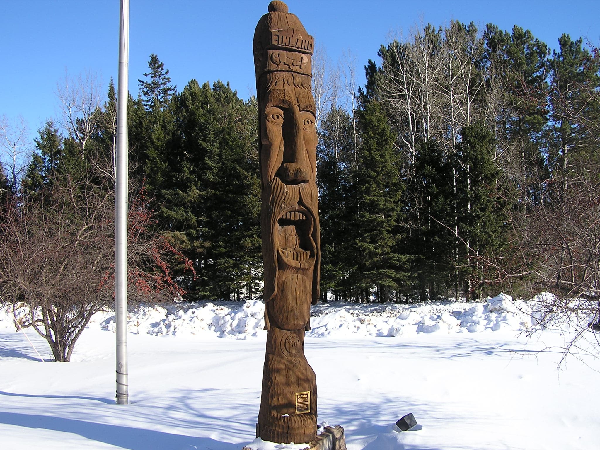 A carved wooden statue of St. Urho greets visitors as they enter the northeast Minnesota town of Finland.