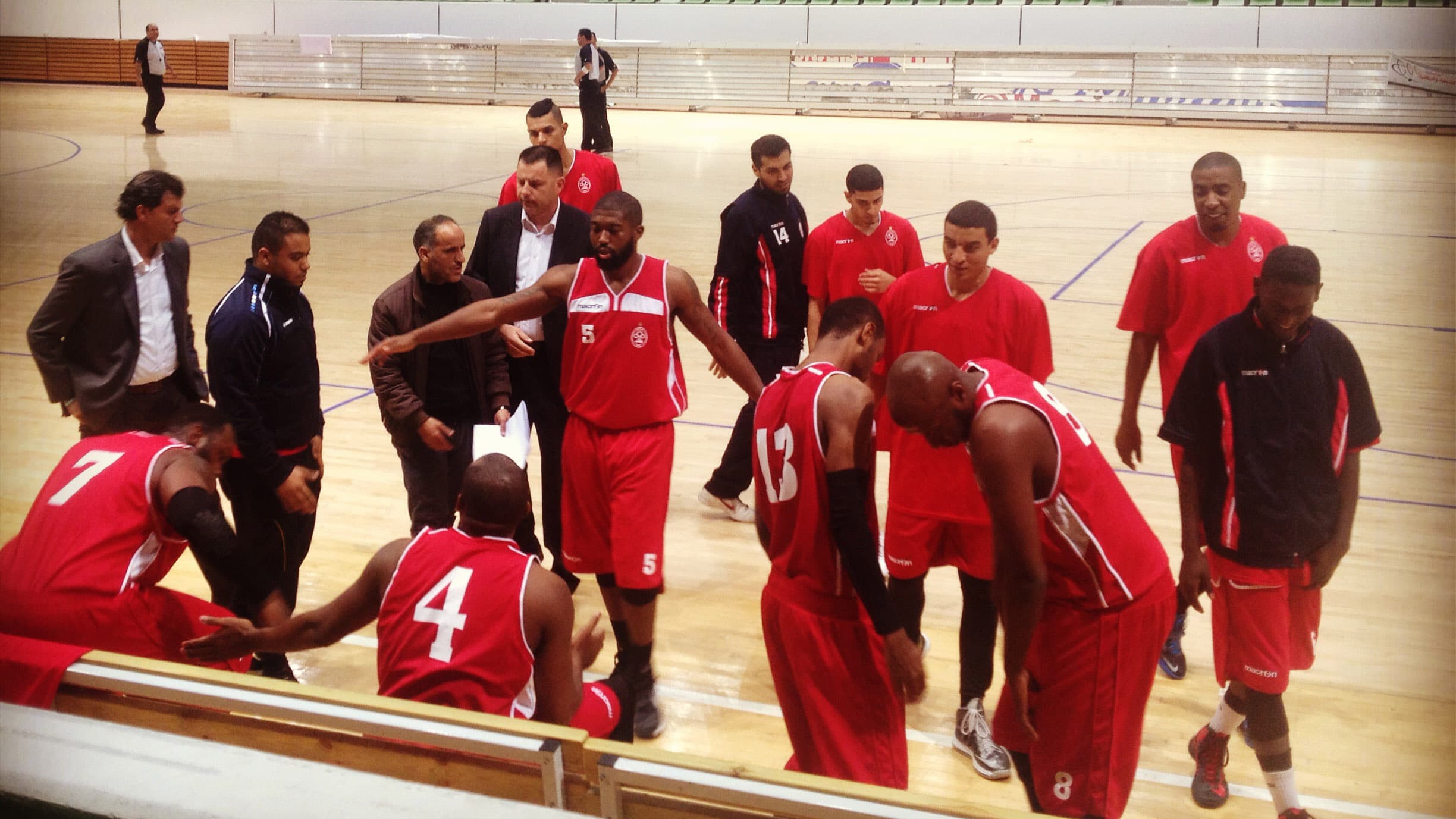 DeAndre Rice (Number 5, with extended arms) scored 47 points in a recent game. He's helped his team, Al Ittihad Tripoli, with the championship this year.