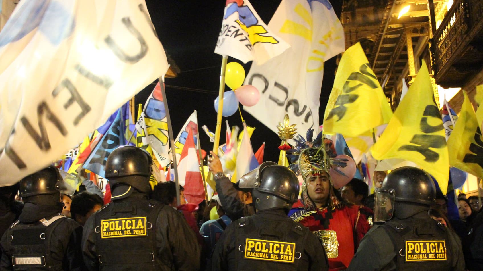 Supporters of Pedro Pablo Kuczynski, pictured, and supporters of Keiko Fujimori marched toward each other near Cuzco's main square last month. Both candidates for Peru's presidency are neck to neck in a heated race.