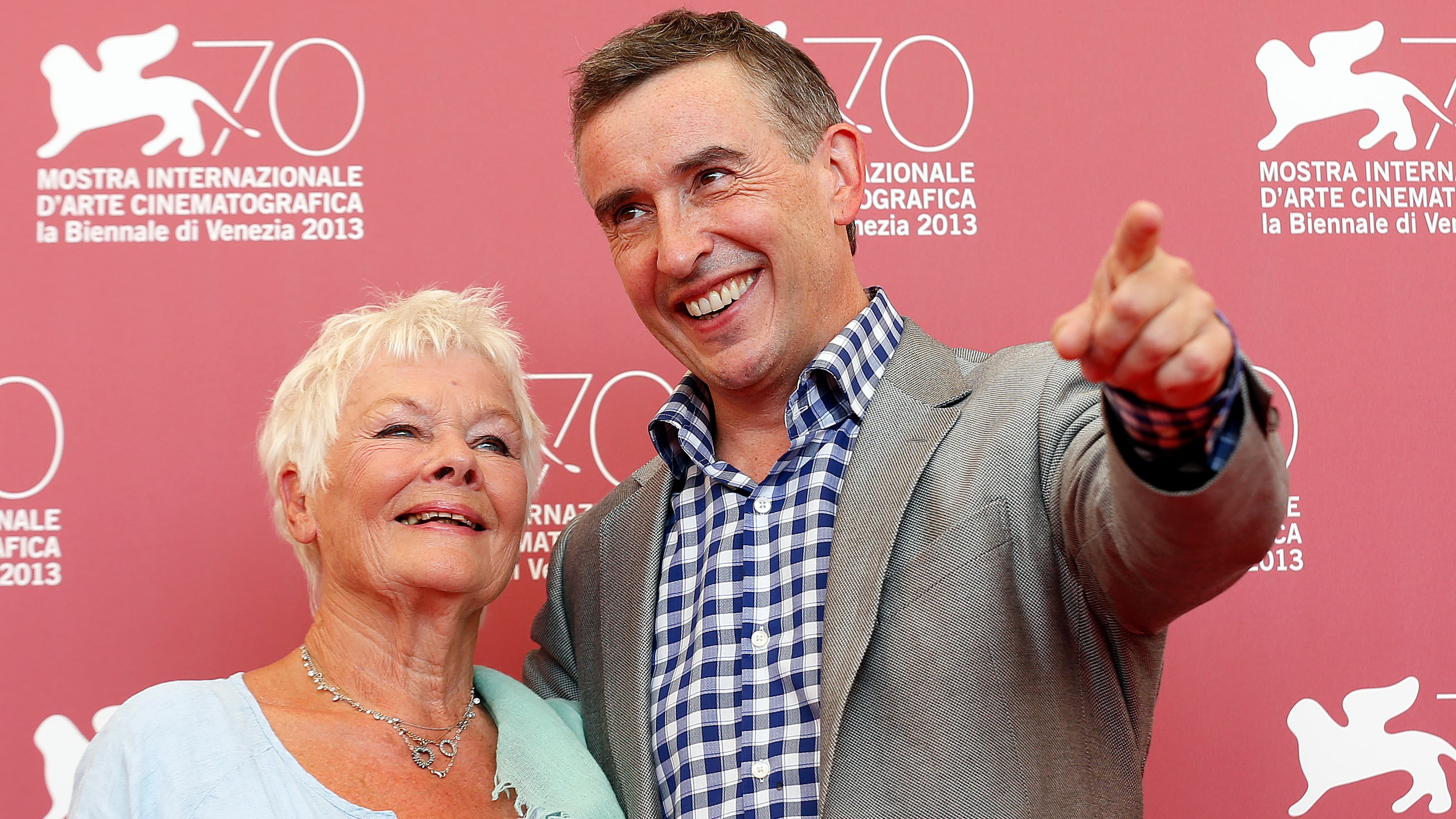 Actors Judi Dench (L) and Steve Coogan (R) pose during a photocall for the movie, "Philomena," during the 70th Venice Film Festival in Venice. It's based on the book, "The Lost Child of Philomena Lee," by former BBC reporter Martin Sixsmith.