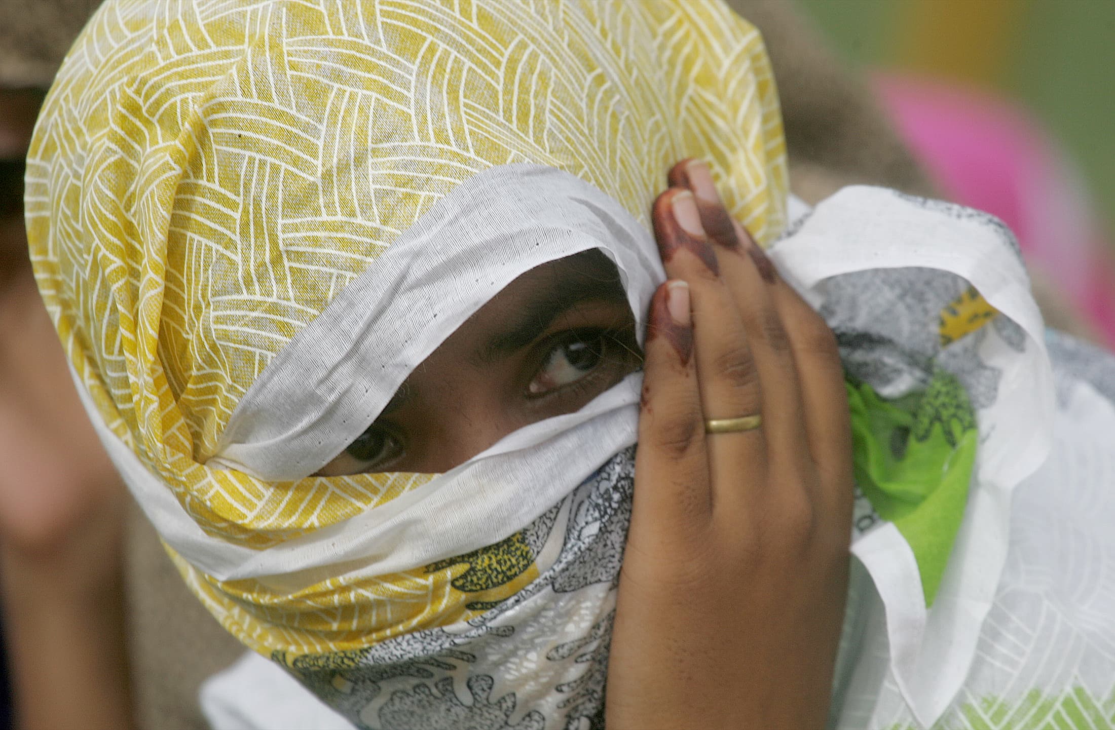 A woman prisoner waits for her release orders inside a jail in Karachi, Pakistan, July 13, 2006.