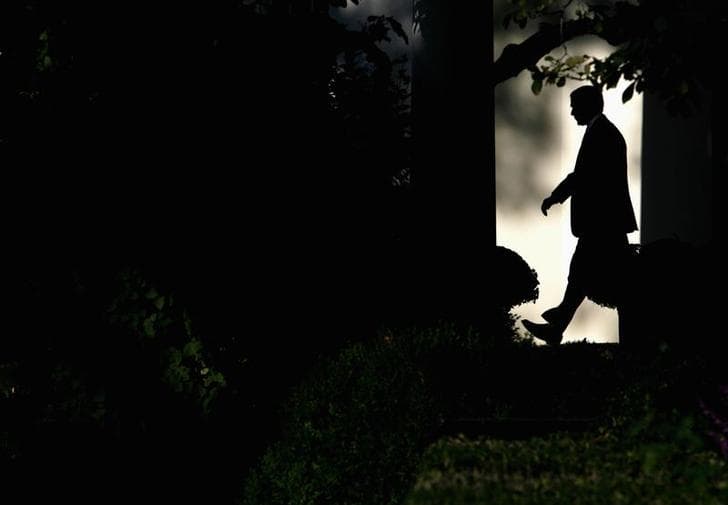 U.S. President George W. Bush departs the Oval Office of the White House for a day trip to South Carolina November 2, 2007.