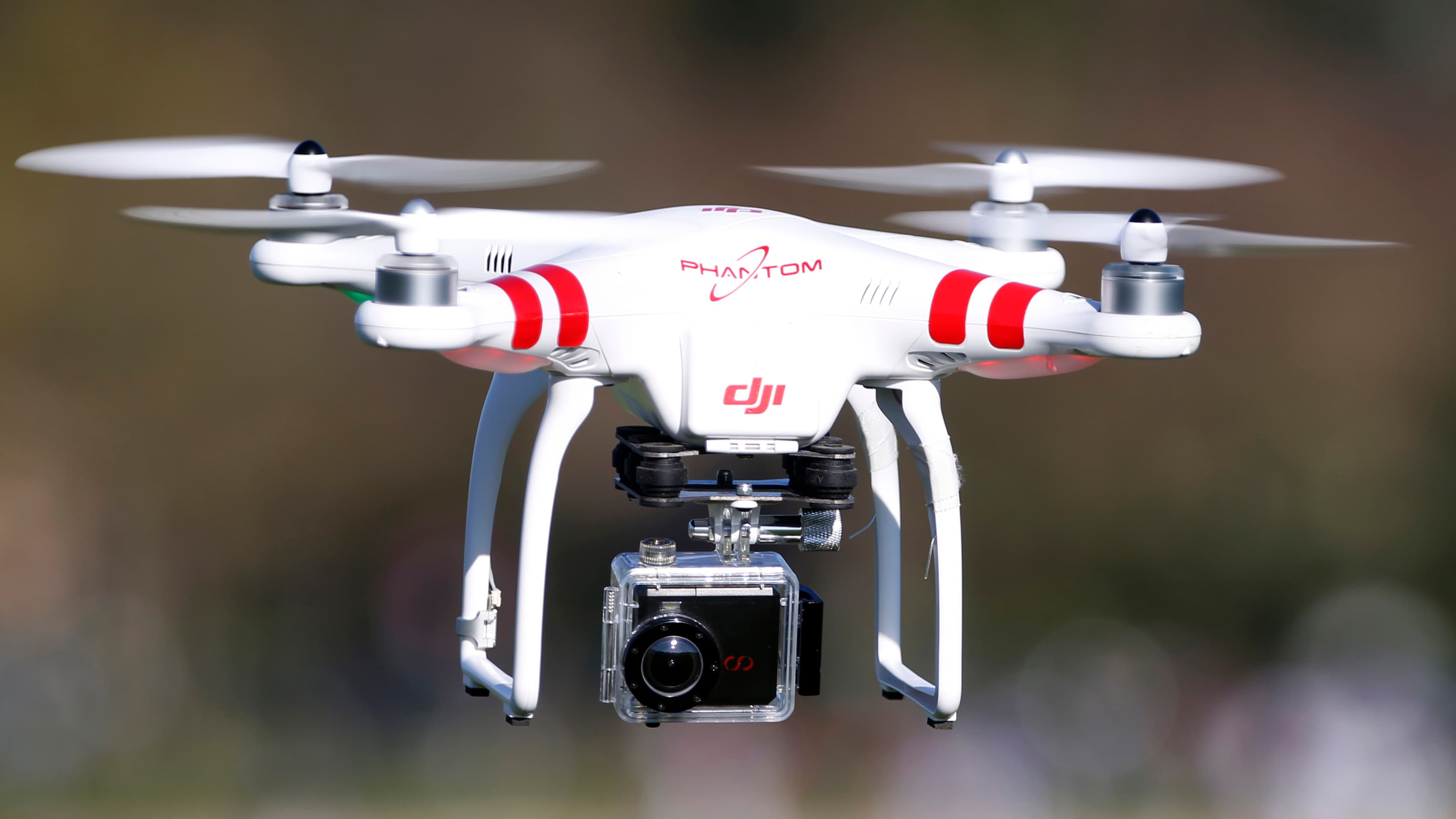 A Phantom drone by DJI flies during the 4th Intergalactic Meeting of Phantom's Pilots in western Paris in March 16, 2014.