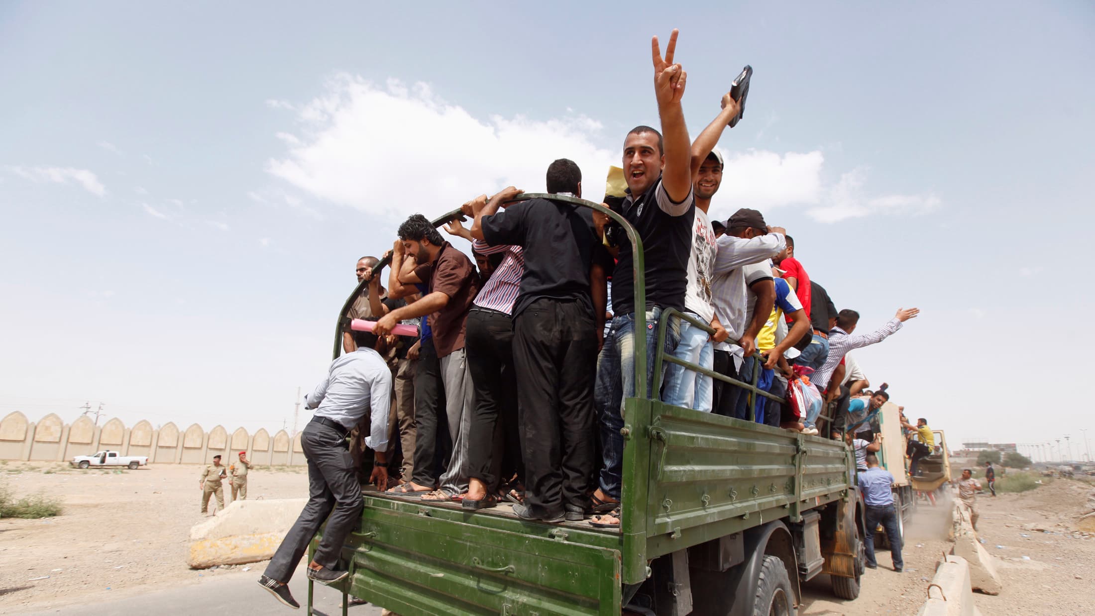 Some of the young Baghdadis who volunteered Friday for the Iraqi Army on Friday.