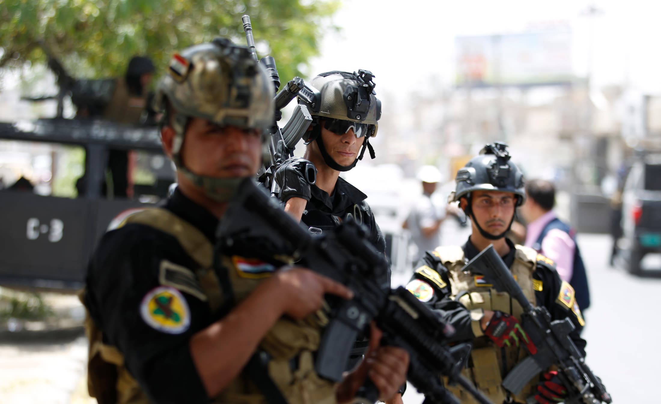 Members of the Iraqi Special Operations Forces take part in an intensive security deployment in Baghdad's Amiriya district, June 18, 2014.